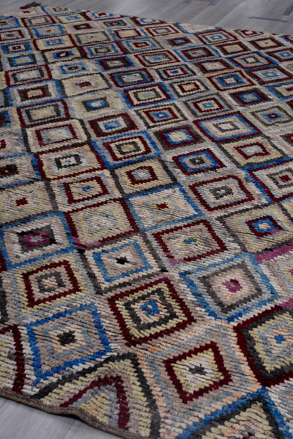 9' x 11' one-of-a-kind handmade vintage Tulu large size rug. Color palette: ivory, gray, charcoal, cobalt, burgundy, rose