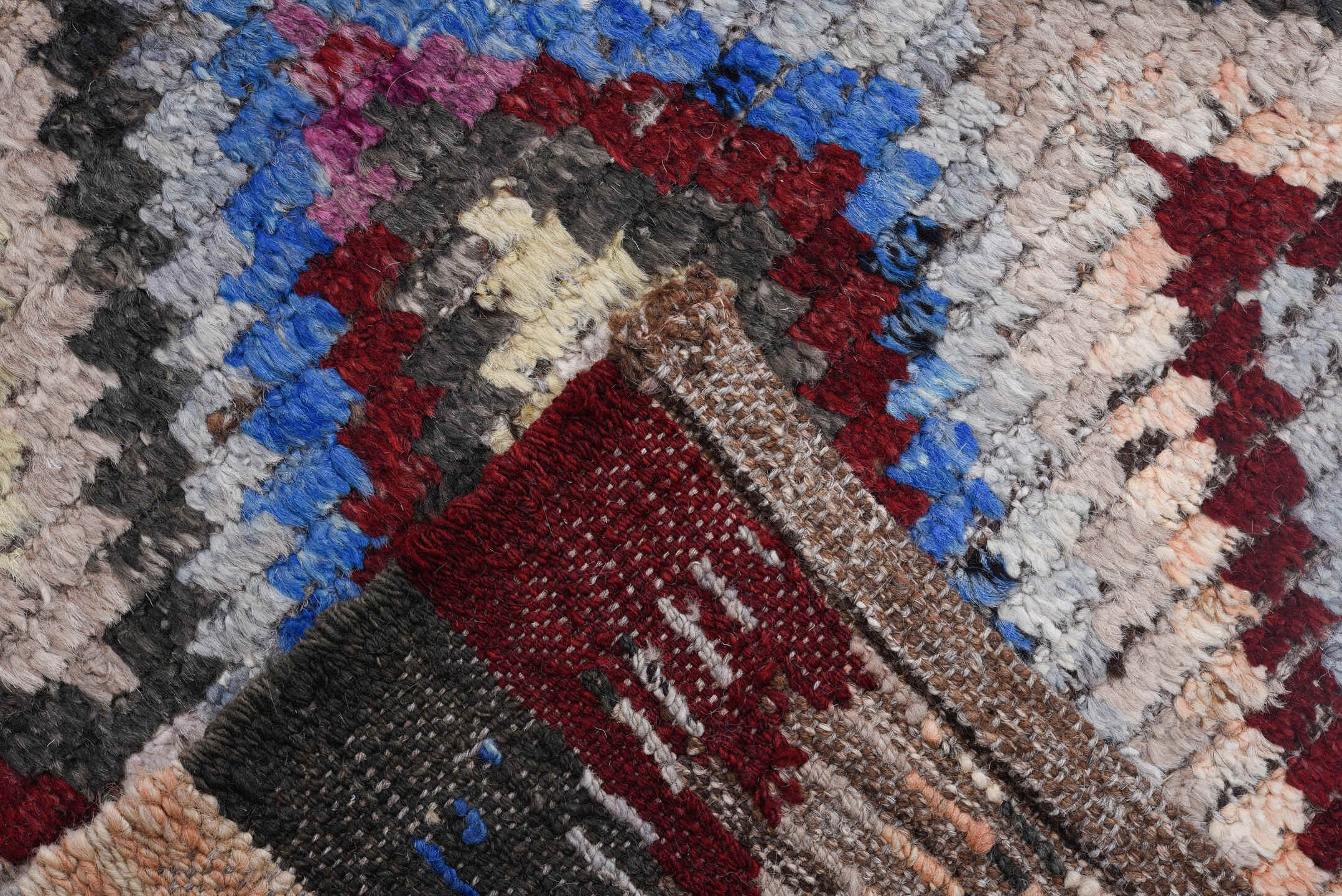 9' x 11' one-of-a-kind handmade vintage Tulu large size rug. Color palette: ivory, gray, charcoal, cobalt, burgundy, rose