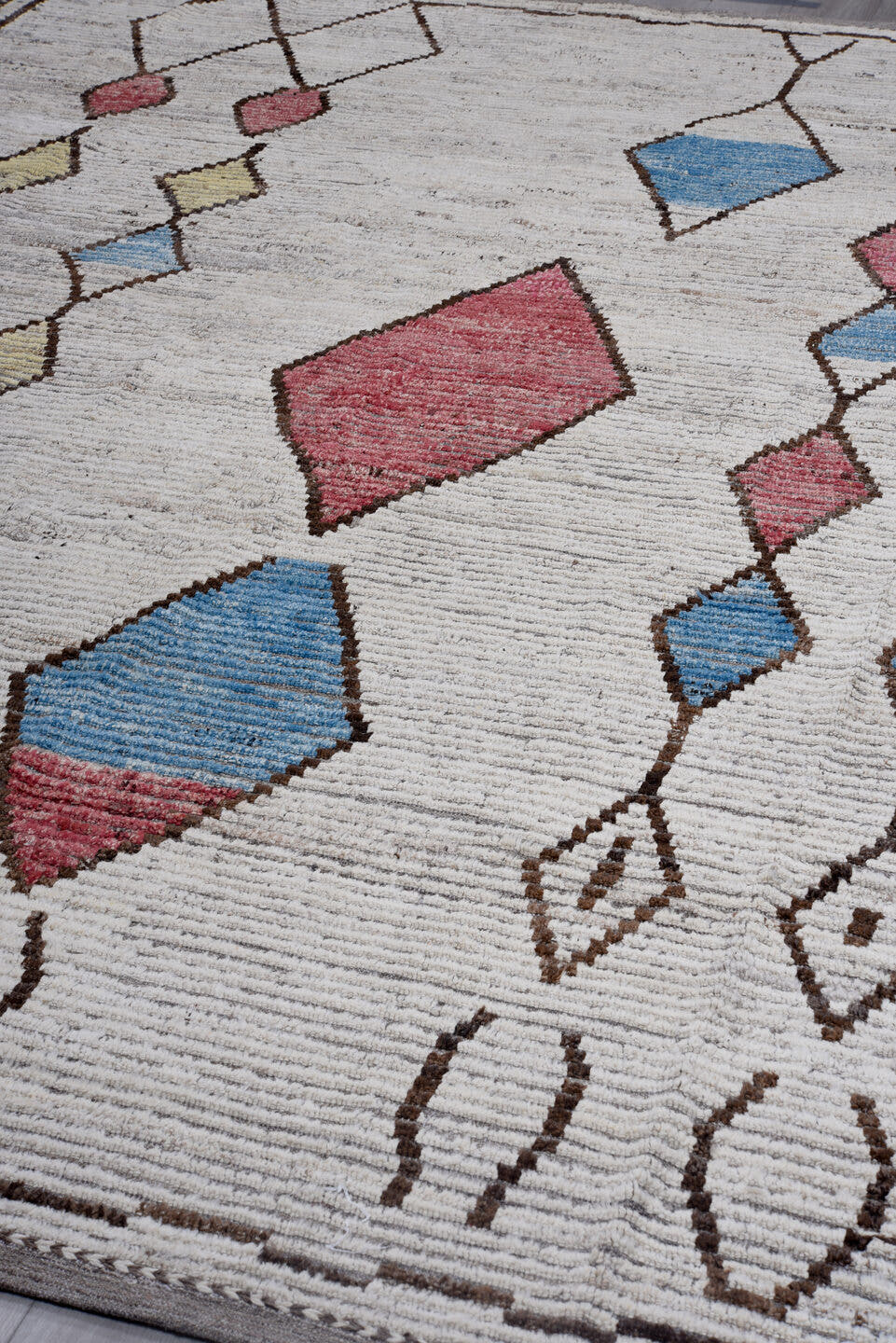 10' x 12' one-of-a-kind handmade vintage Tulu large size rug. Color palette: ivory, brown, gray, rose, sky blue, gold, pink