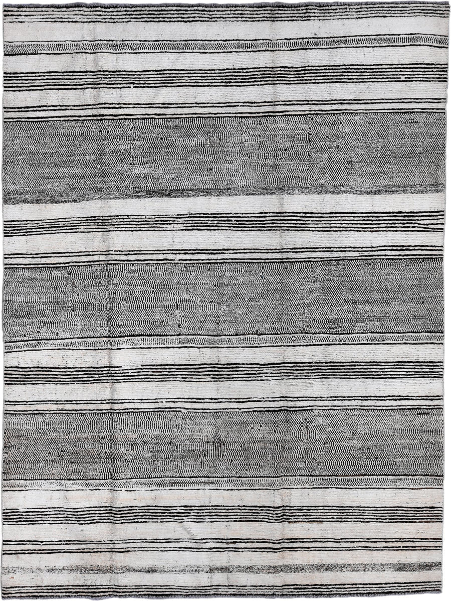 7' x 9' one-of-a-kind handmade vintage Tulu large size rug. Color palette: ivory, charcoal, gray, black