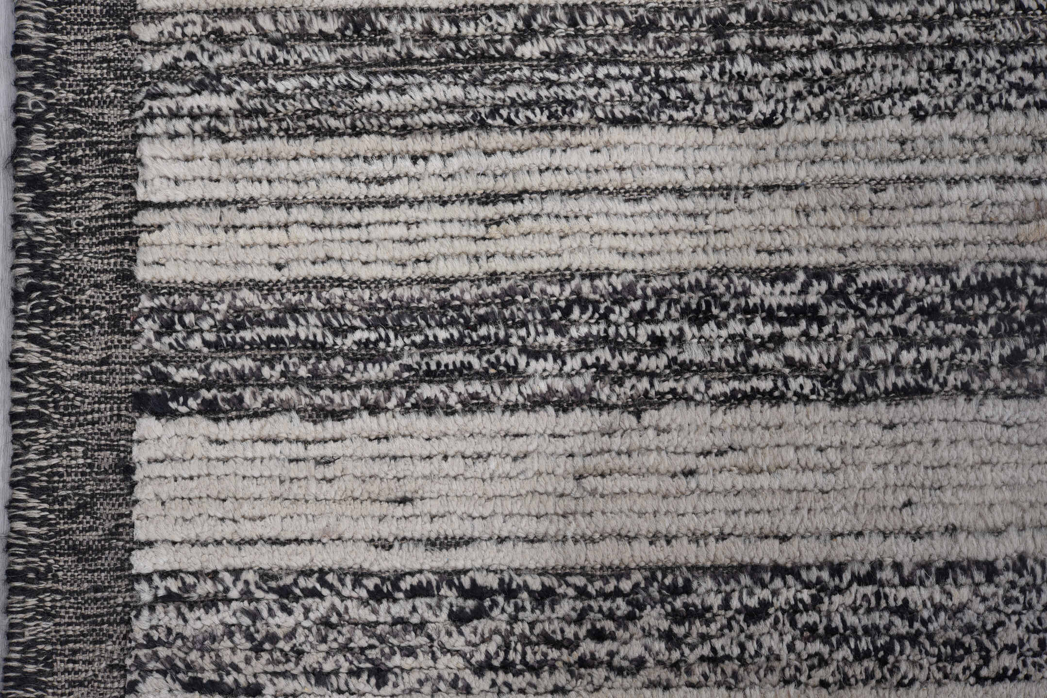 7' x 11' one-of-a-kind handmade vintage Tulu large size rug. Color palette: charcoal, ivory, gray, black