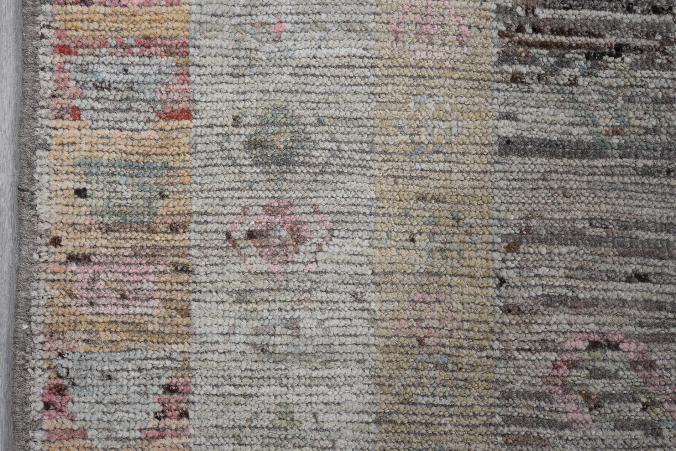 7' x 9' one-of-a-kind handmade vintage Tulu rug. Color palette: ivory, taupe, brown, blush, sage, camel, gray, beige, pink