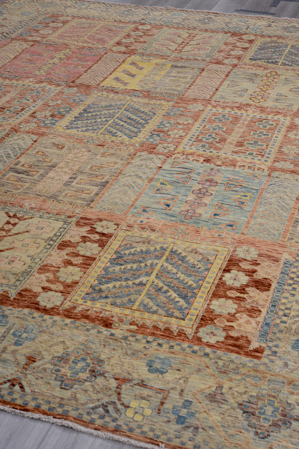 9' x 11' one-of-a-kind handmade vintage Afghan large size rug. Color palette: rust, ivory, sky blue, gold, rose, taupe