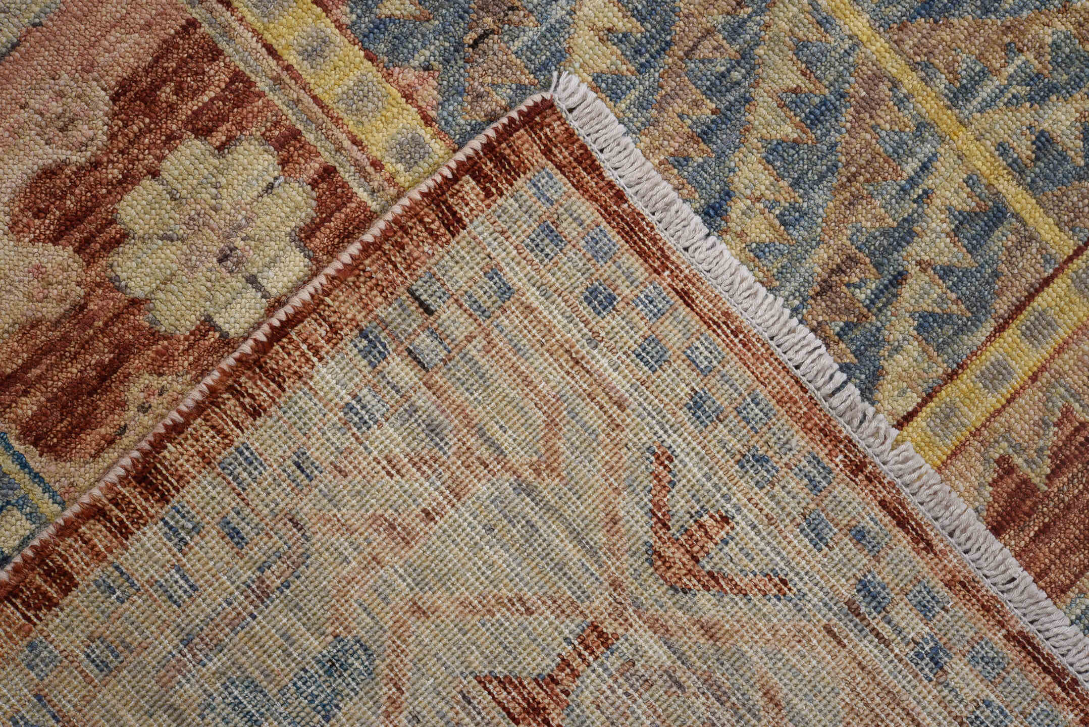 9' x 11' one-of-a-kind handmade vintage Afghan large size rug. Color palette: rust, ivory, sky blue, gold, rose, taupe