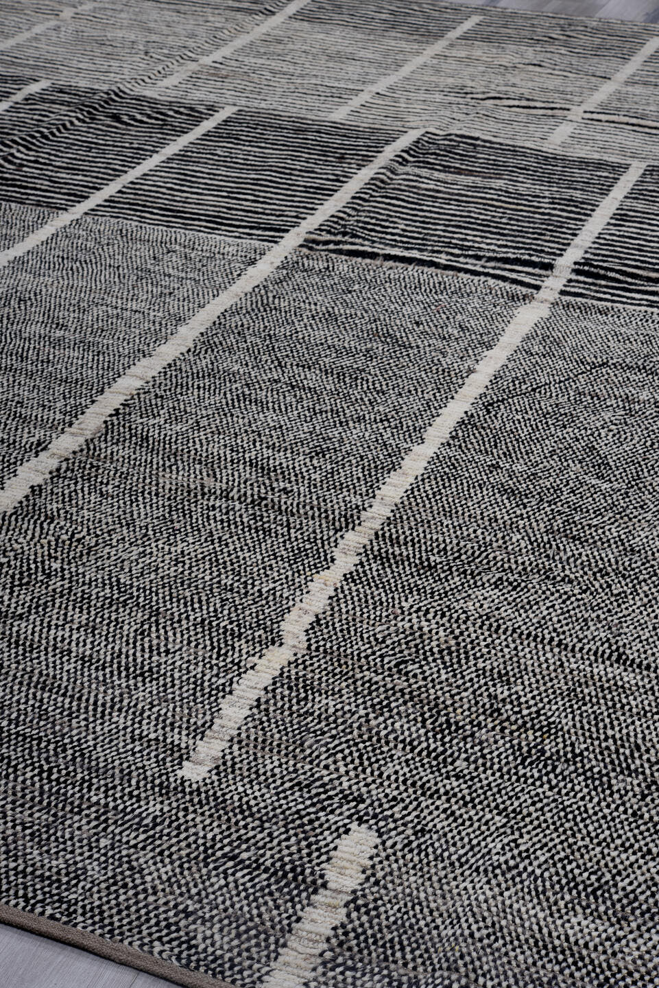 11' x 14' one-of-a-kind handmade vintage Tulu oversize rug. Color palette: gray, charcoal, ivory, black