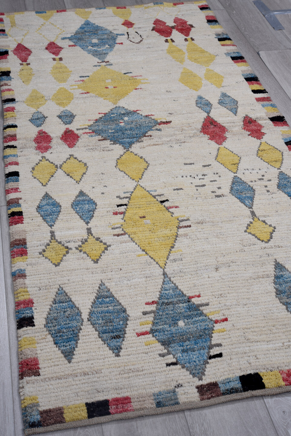 3' x 7' one-of-a-kind handmade vintage Tulu runner rug. Color palette: ivory, blue, gold, rose, black, taupe, pink, red