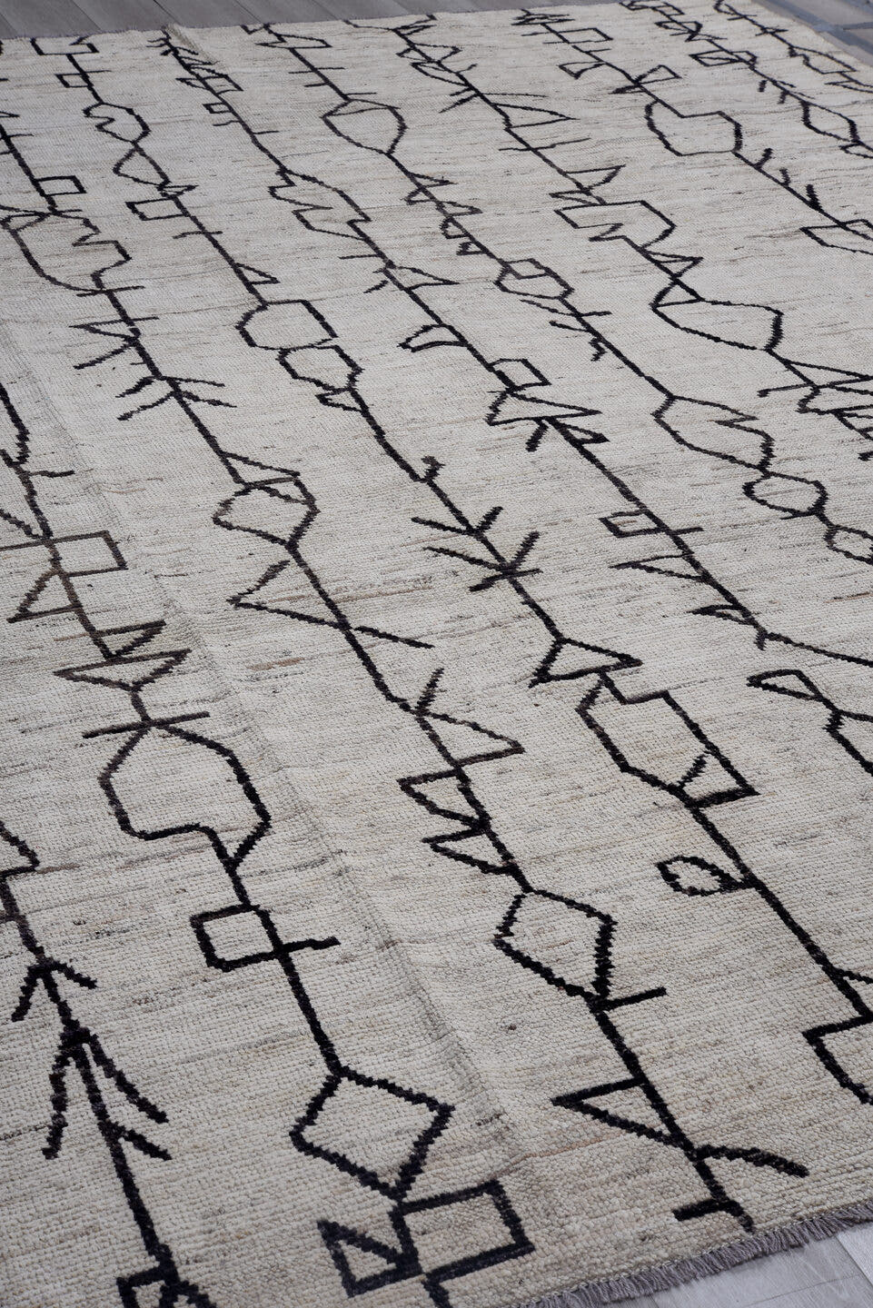 9' x 11' one-of-a-kind handmade vintage Tulu large size rug. Color palette: ivory, charcoal, taupe, gray, black, beige