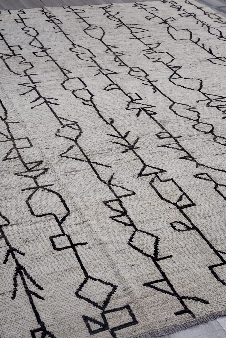9' x 11' one-of-a-kind handmade vintage Tulu large size rug. Color palette: ivory, charcoal, taupe, gray, black, beige
