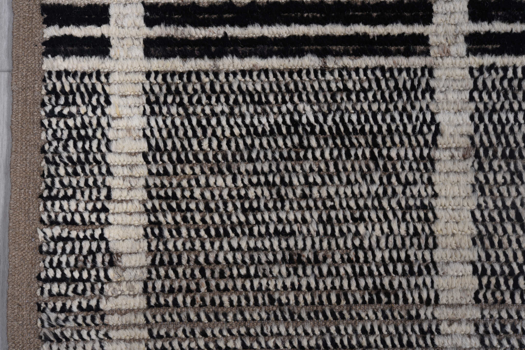 10' x 13' one-of-a-kind handmade vintage Tulu large size rug. Color palette: charcoal, ivory, gray, taupe, black, beige