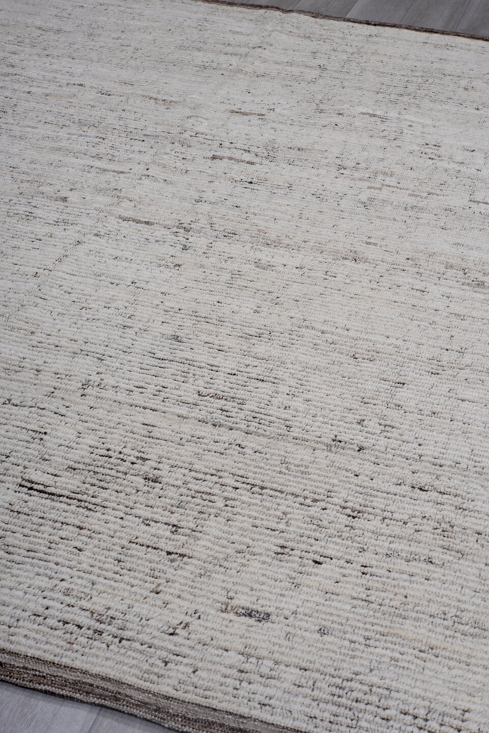8' x 9' one-of-a-kind handmade vintage Tulu large size rug. Color palette: ivory, taupe, brown, charcoal, beige, gray, black