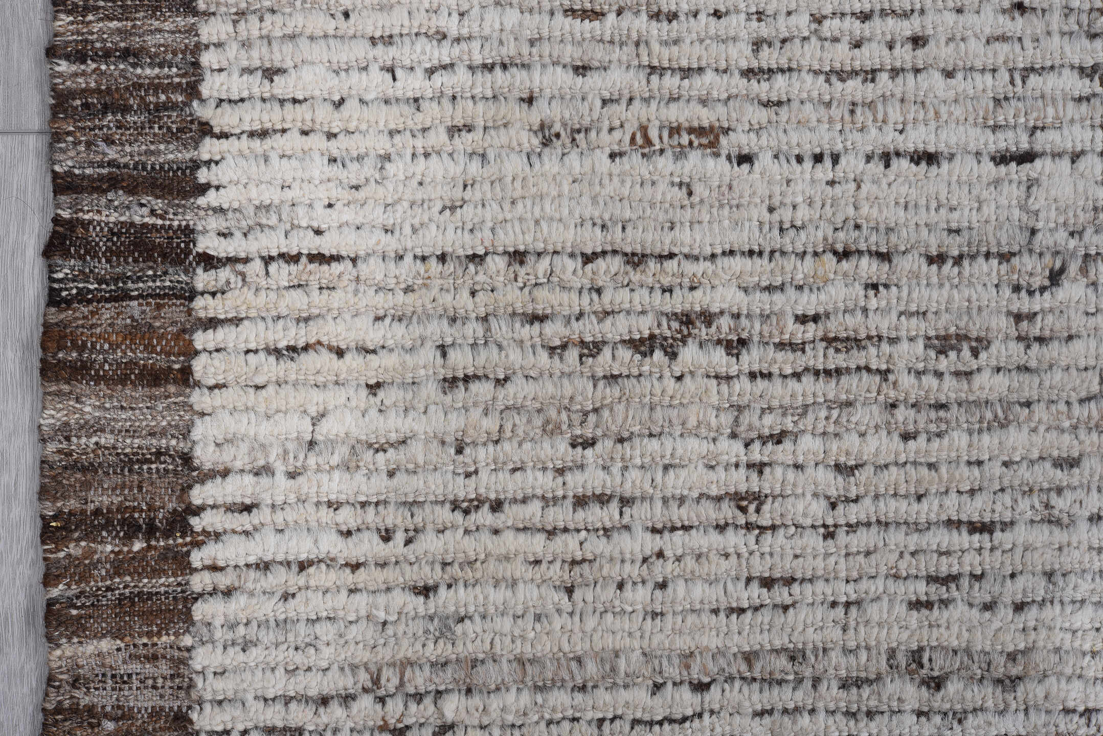 8' x 9' one-of-a-kind handmade vintage Tulu large size rug. Color palette: ivory, taupe, brown, charcoal, beige, gray, black