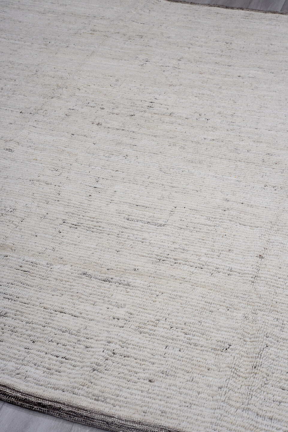 8' x 9' one-of-a-kind handmade vintage Tulu large size rug. Color palette: ivory, charcoal, taupe, brown, cream, gray, black