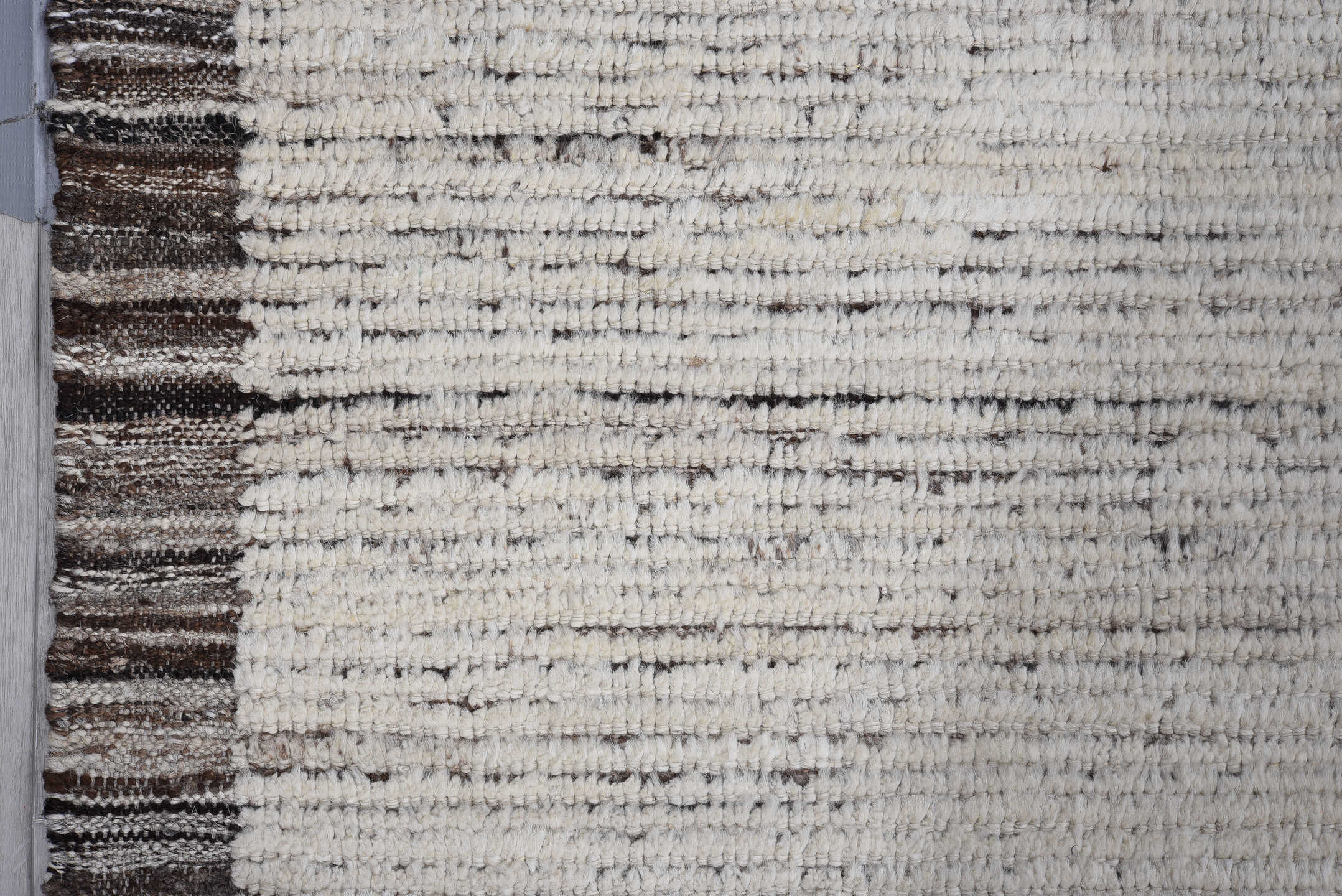 8' x 9' one-of-a-kind handmade vintage Tulu large size rug. Color palette: ivory, charcoal, taupe, brown, cream, gray, black