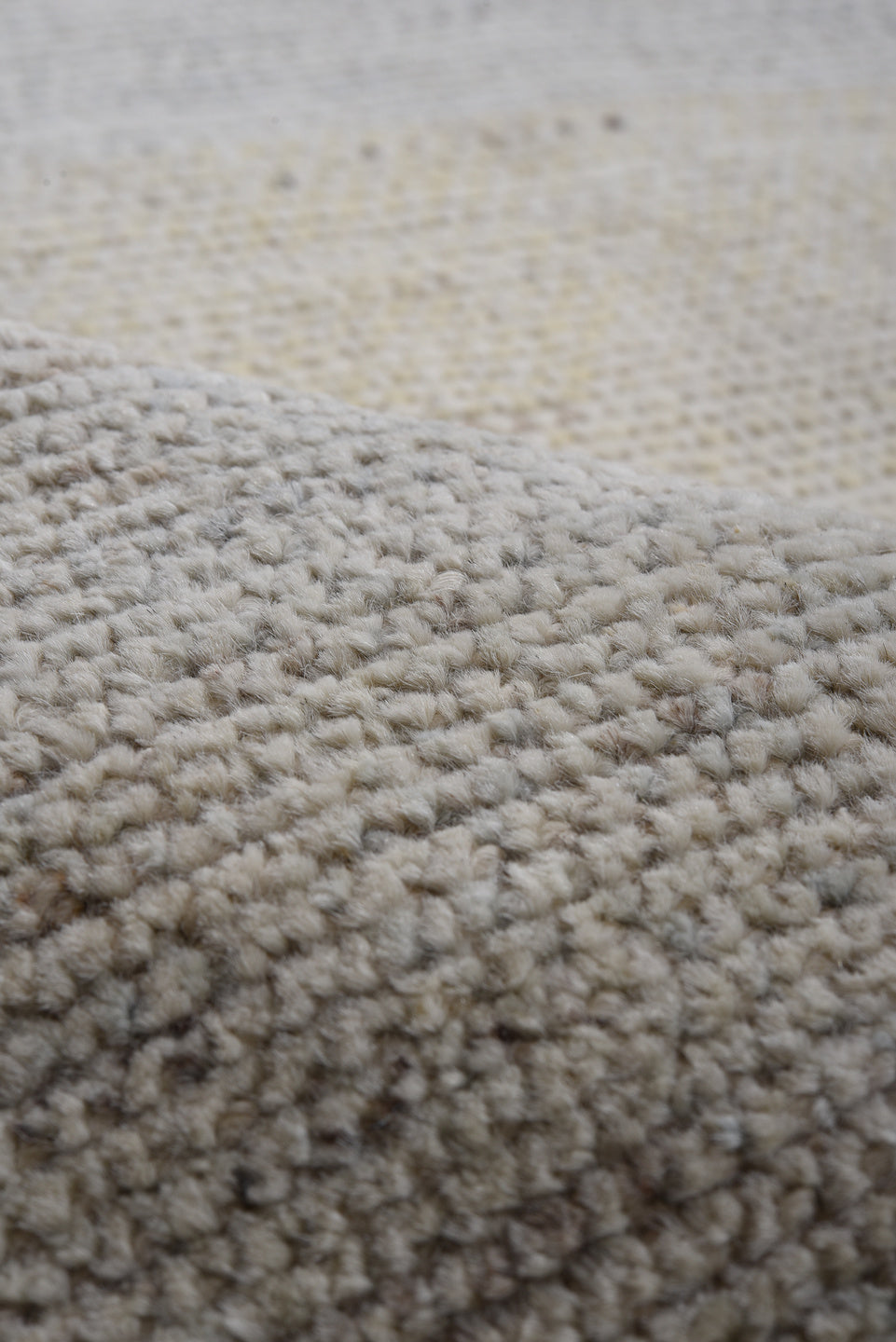 10' x 13' one-of-a-kind handmade vintage Tulu large size rug. Color palette: ivory, pale gray, cream, soft coral, saffron