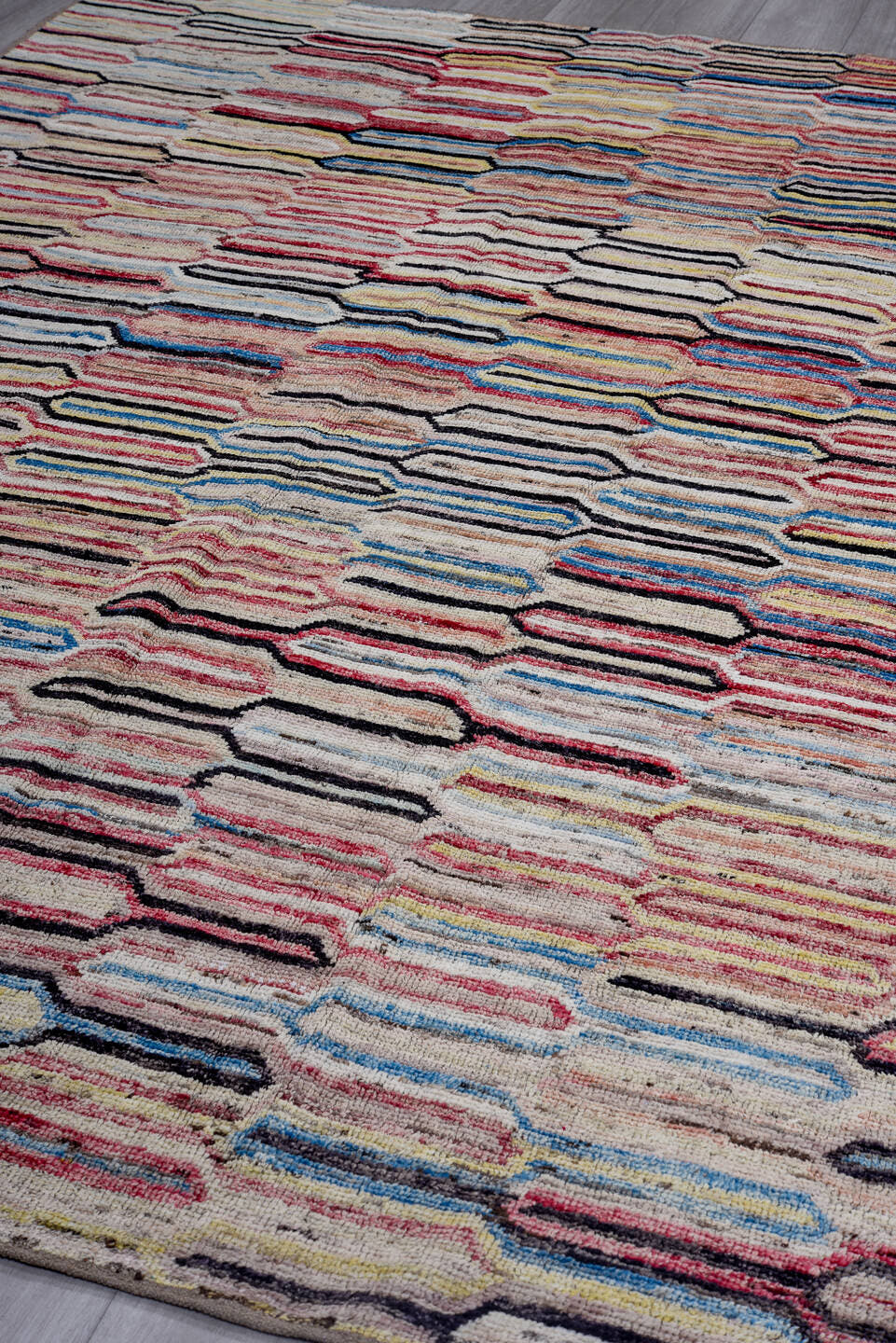 7' x 9' one-of-a-kind handmade vintage Tulu large size rug. Color palette: ivory, rose, charcoal, sky blue, gold, coral
