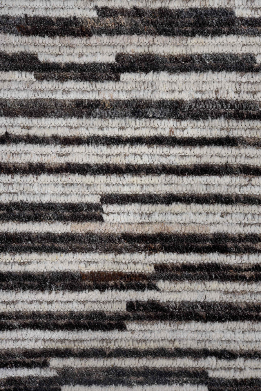 9' x 11' one-of-a-kind handmade vintage Tulu large size rug. Color palette: ivory, taupe, charcoal, brown, cream, black