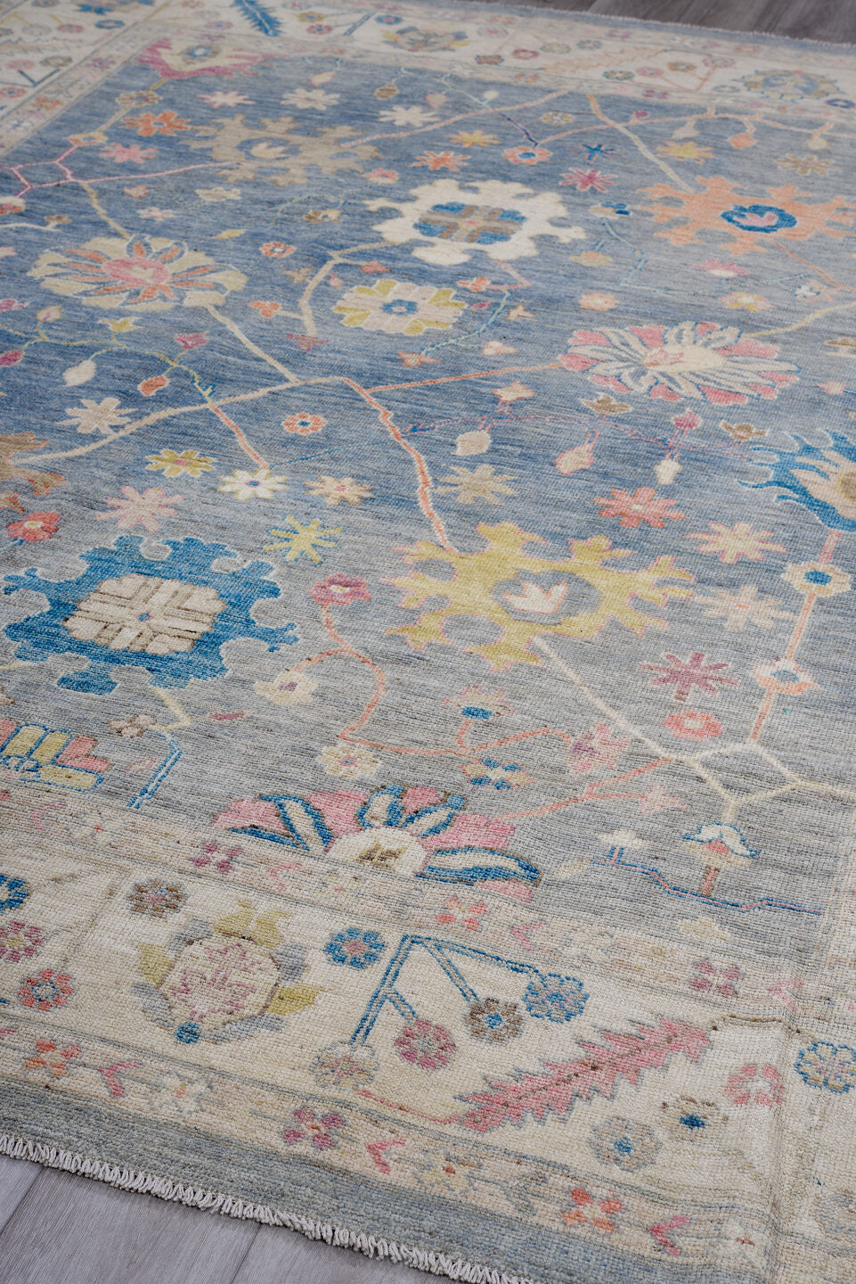 8' x 9' one-of-a-kind handmade vintage Oushak large size rug. Color palette: blue, ivory, rose, gold, sage, taupe, coral