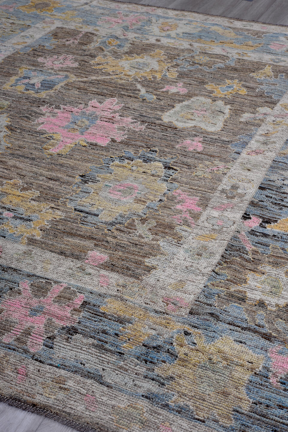 8' x 9' one-of-a-kind handmade vintage Oushak large size rug. Color palette: taupe, sky blue, ivory, pink, gold, brown, gray