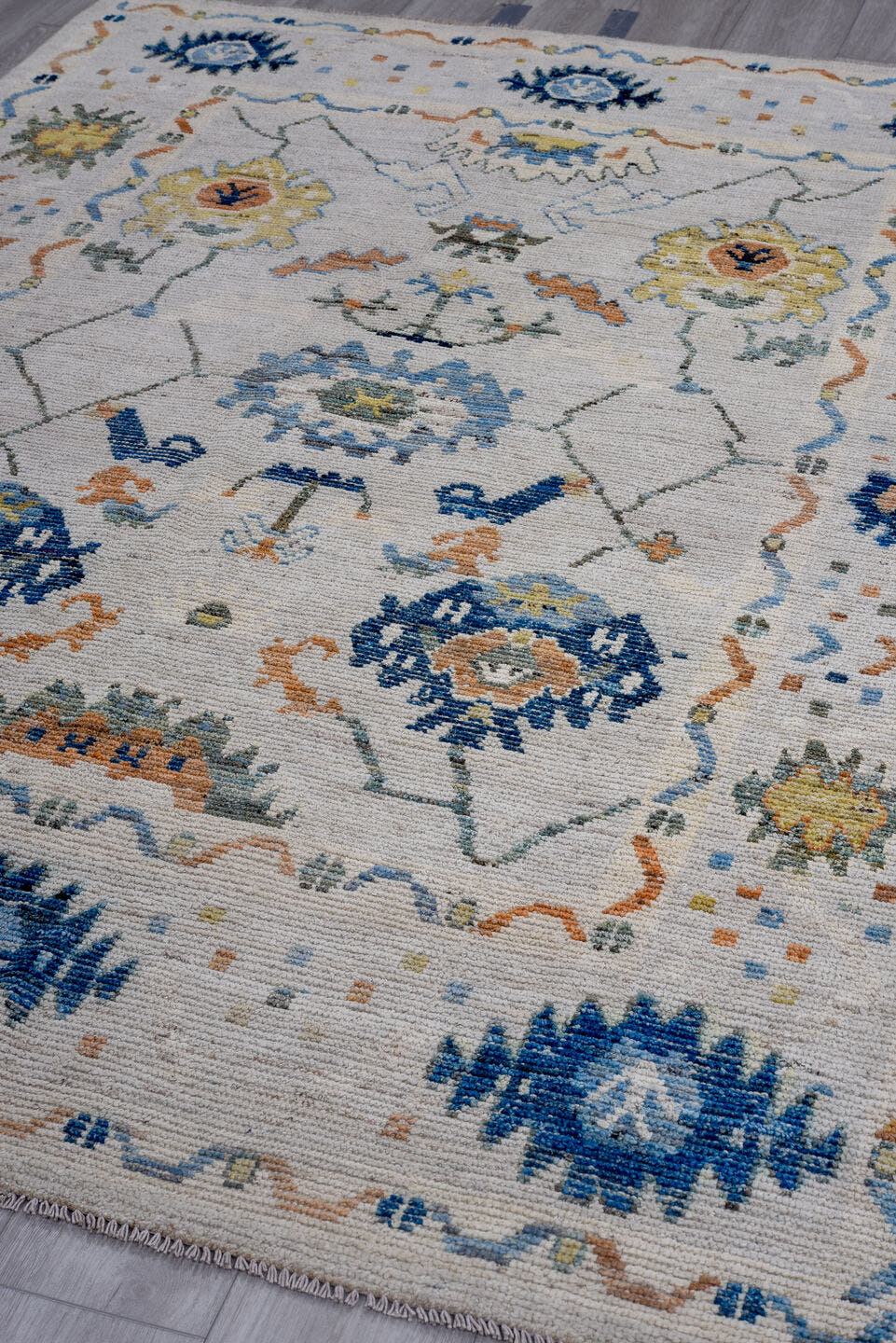 5' x 8' one-of-a-kind handmade vintage Oushak medium size rug. Color palette: ivory, blue, sky blue, rust, gold, sage