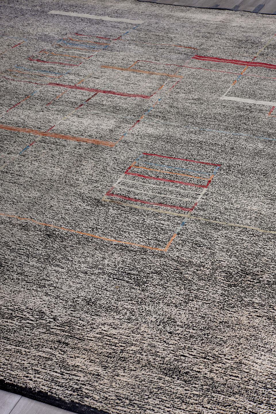 12' x 15' one-of-a-kind handmade vintage Tulu oversize rug. Color palette: gray, charcoal, crimson, ivory, rust, blue, black