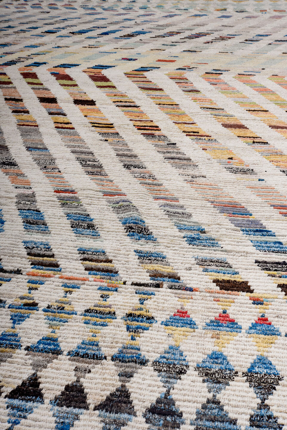 16' x 20' one-of-a-kind handmade vintage Tulu oversize rug. Color palette: ivory, gray, blue, charcoal, coral, gold, taupe