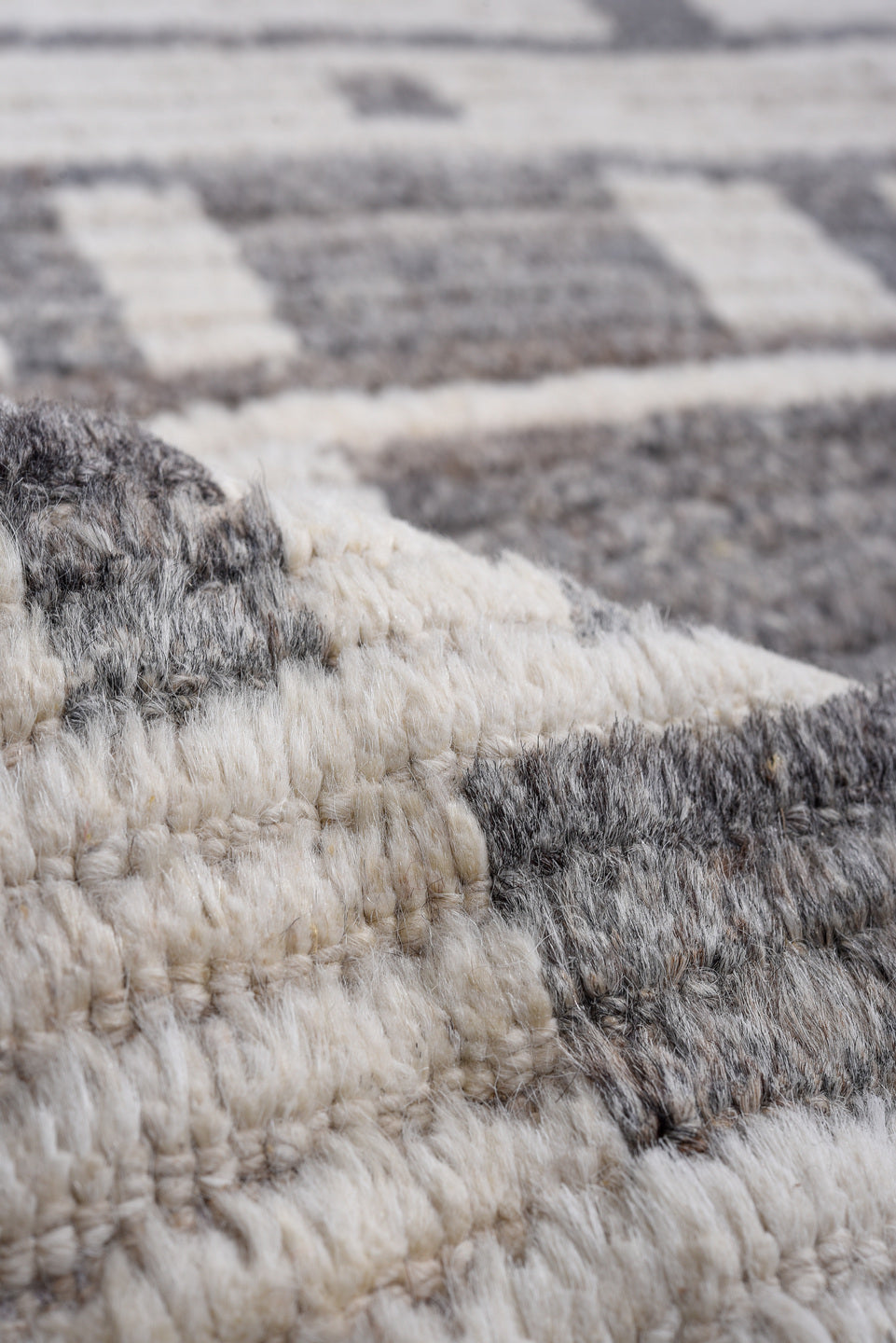 14' x 17' one-of-a-kind handmade vintage Tulu oversize rug. Color palette: ivory, charcoal, taupe, gray, black, beige