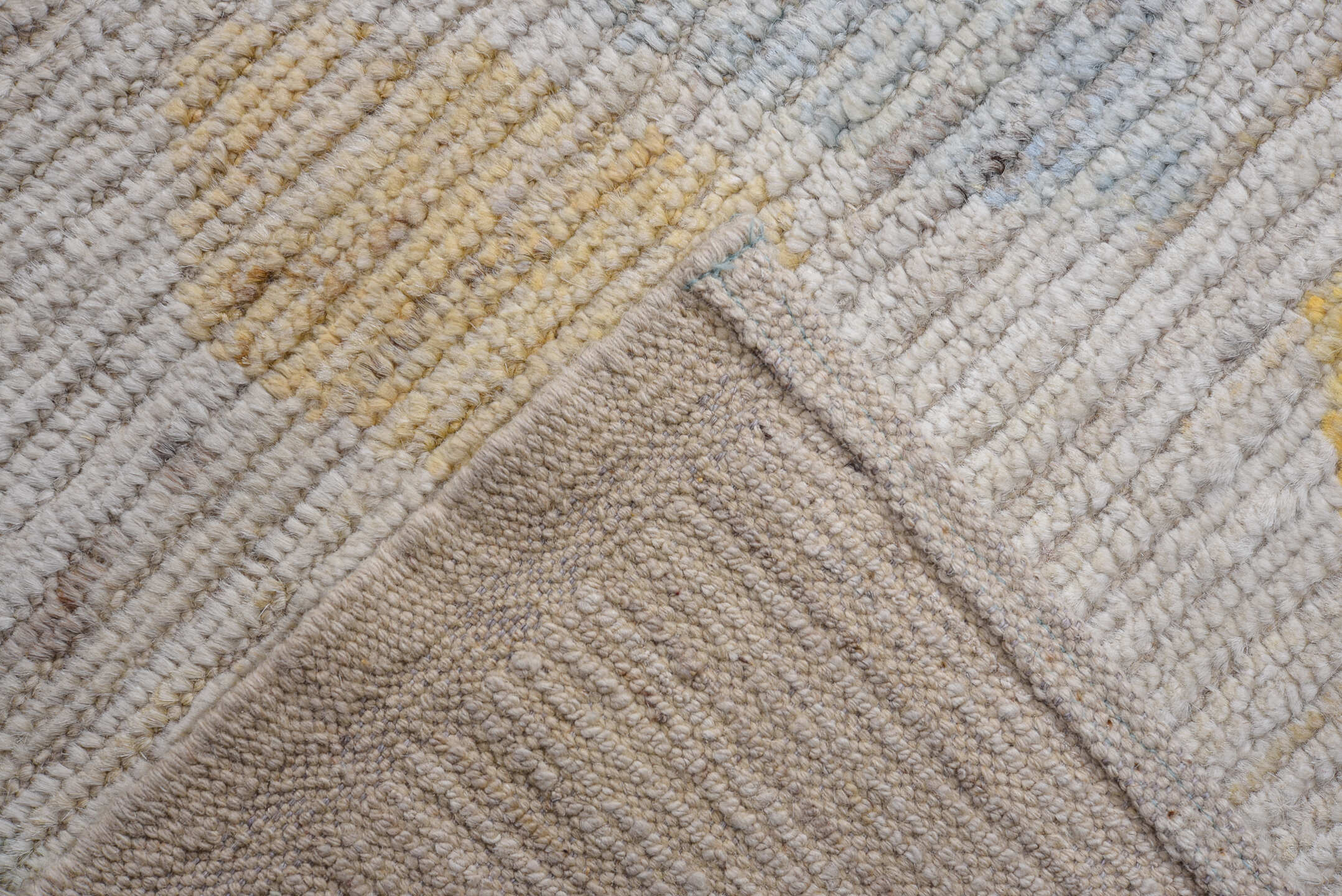 13' x 16' one-of-a-kind handmade vintage Tulu oversize rug. Color palette: ivory, taupe, coral, aqua, gold, sage, lavender