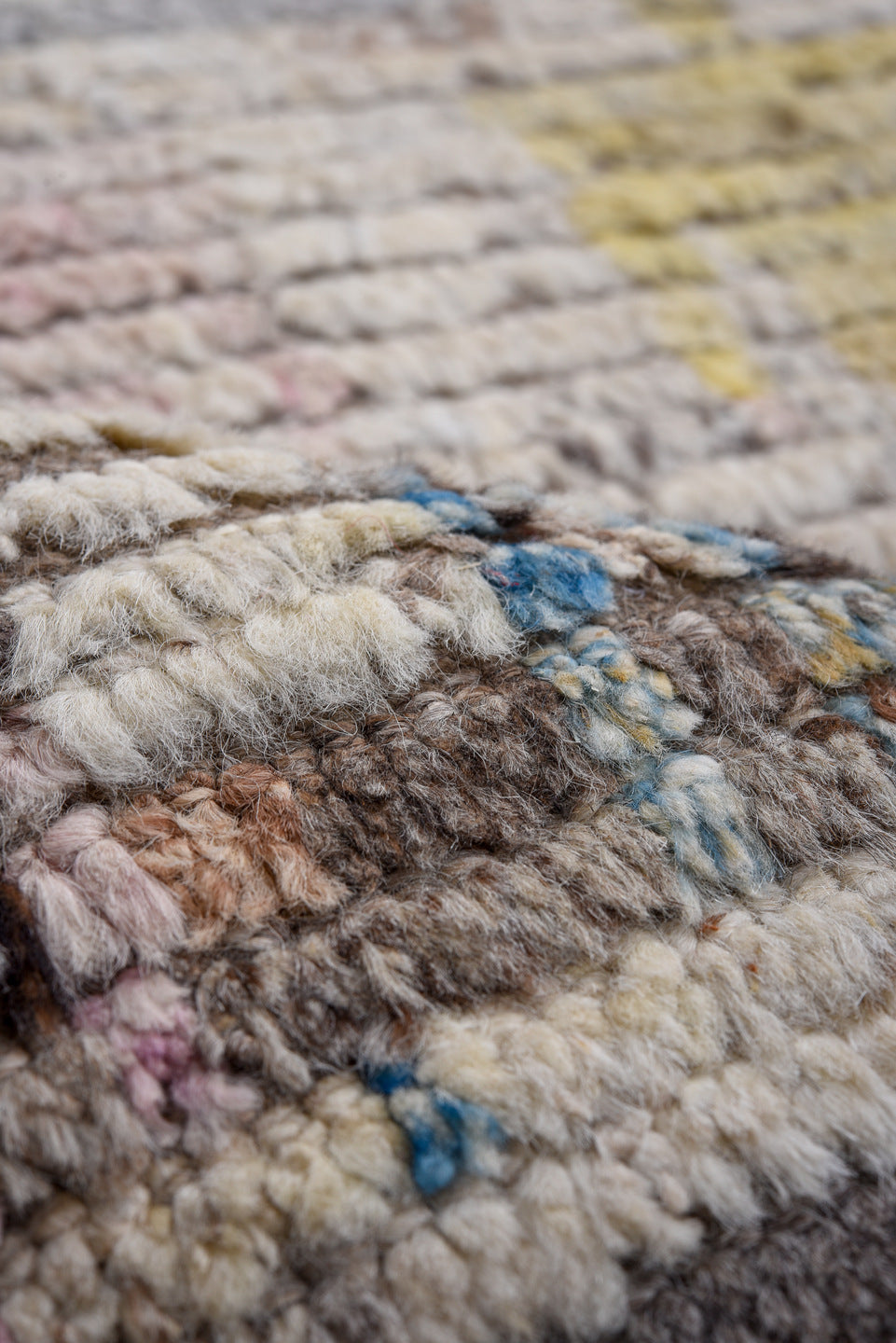 13' x 16' one-of-a-kind handmade vintage Tulu oversize rug. Color palette: ivory, gray, pink, charcoal, sky blue, gold