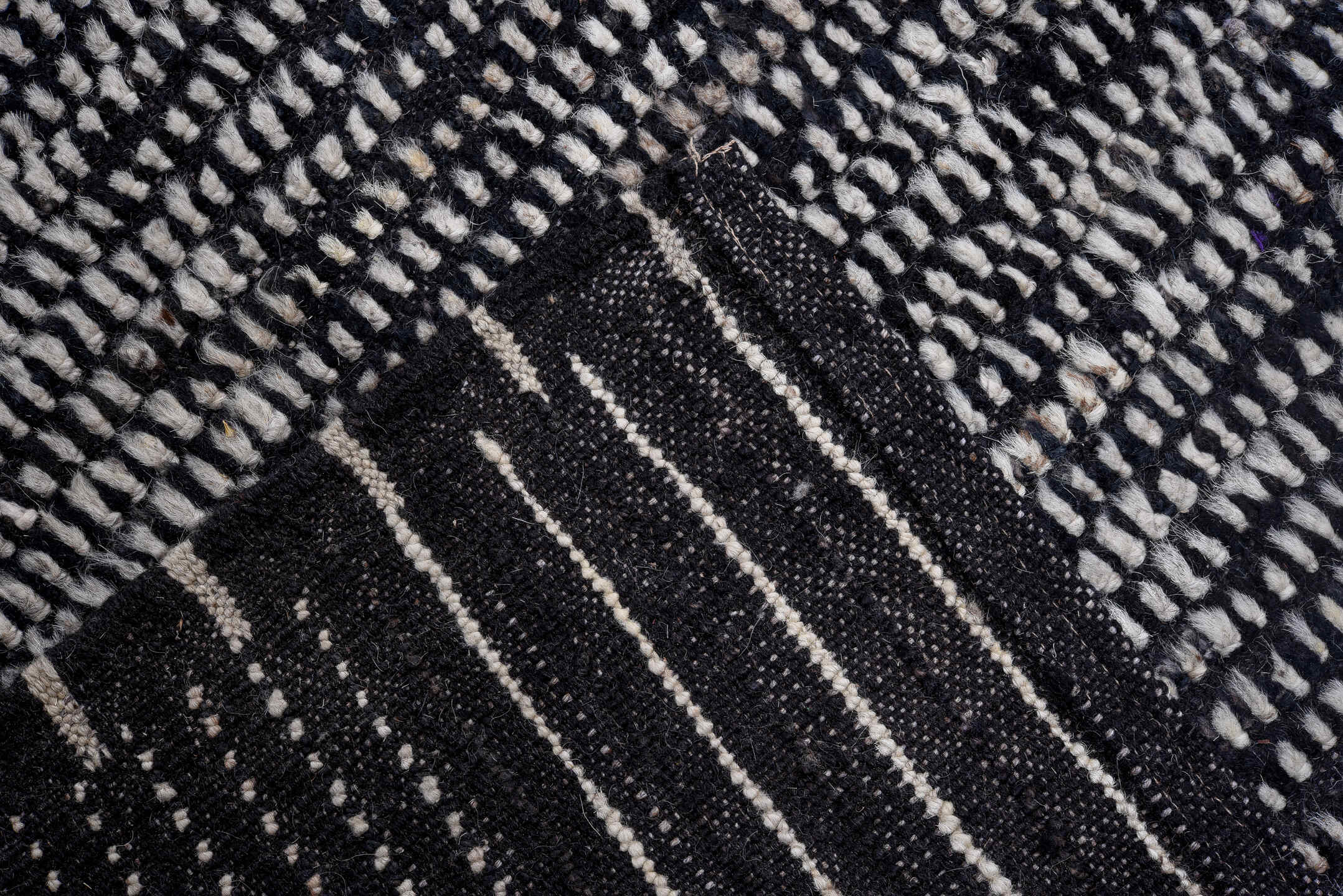 13' x 13' one-of-a-kind handmade vintage Tulu oversize rug. Color palette: charcoal, ivory, gray, black
