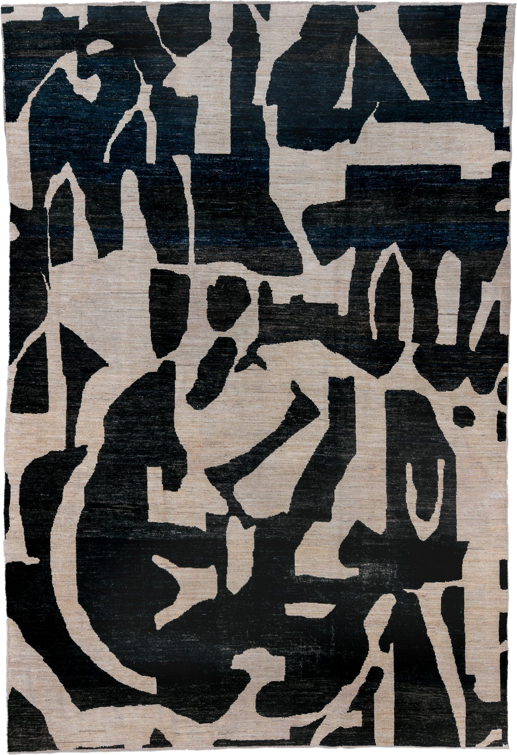 10' x 14' one-of-a-kind handmade vintage Tulu rug. Color palette: ivory, charcoal, black, slate, gray