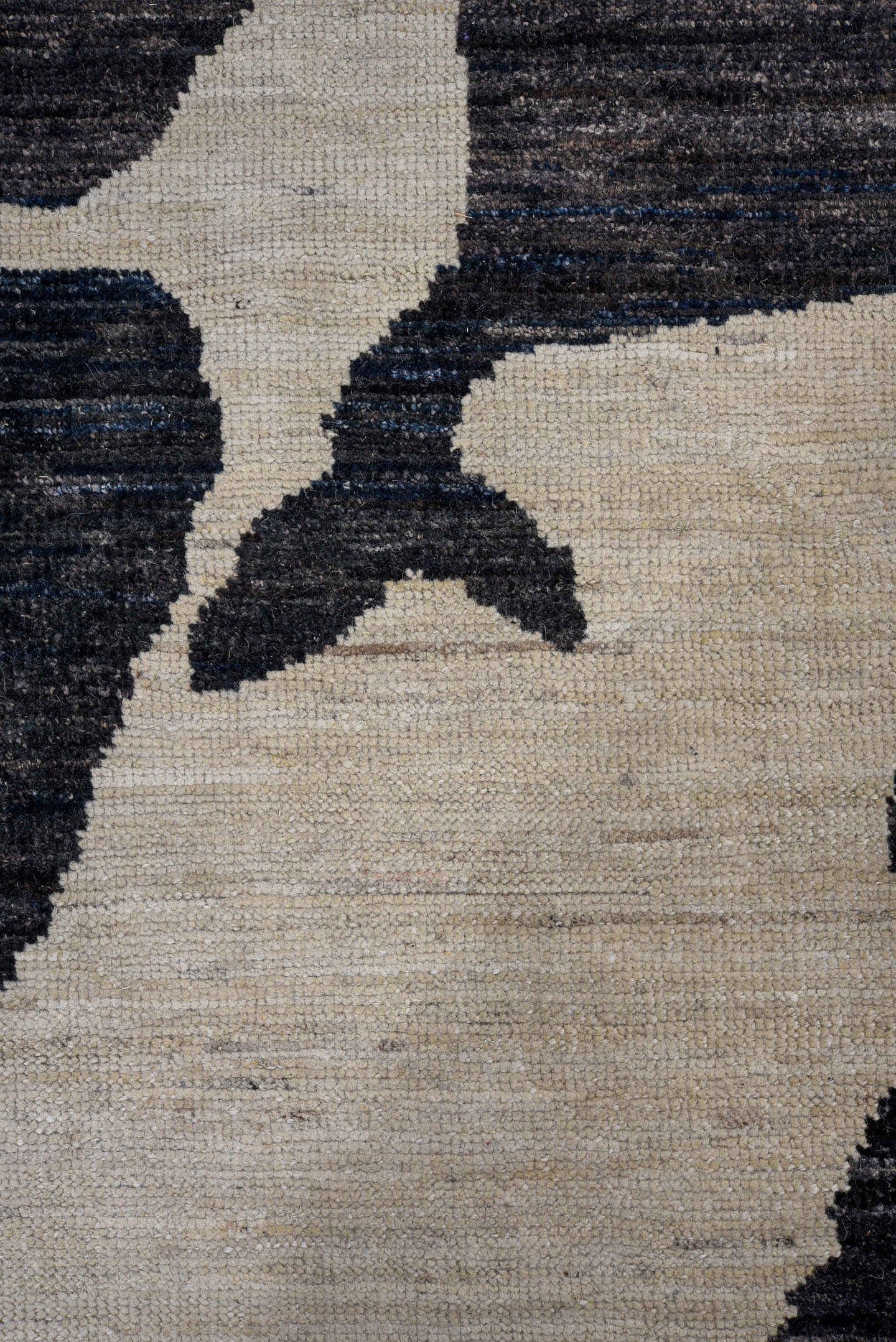 10' x 14' one-of-a-kind handmade vintage Tulu rug. Color palette: ivory, charcoal, black, slate, gray