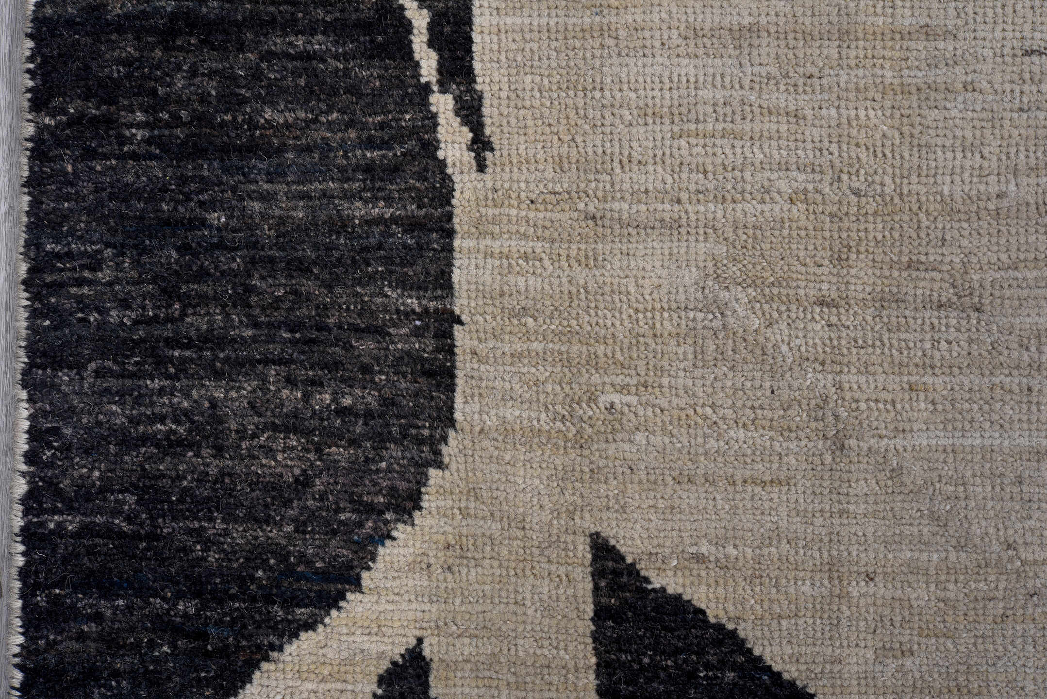 10' x 14' one-of-a-kind handmade vintage Tulu rug. Color palette: ivory, charcoal, black, slate, gray