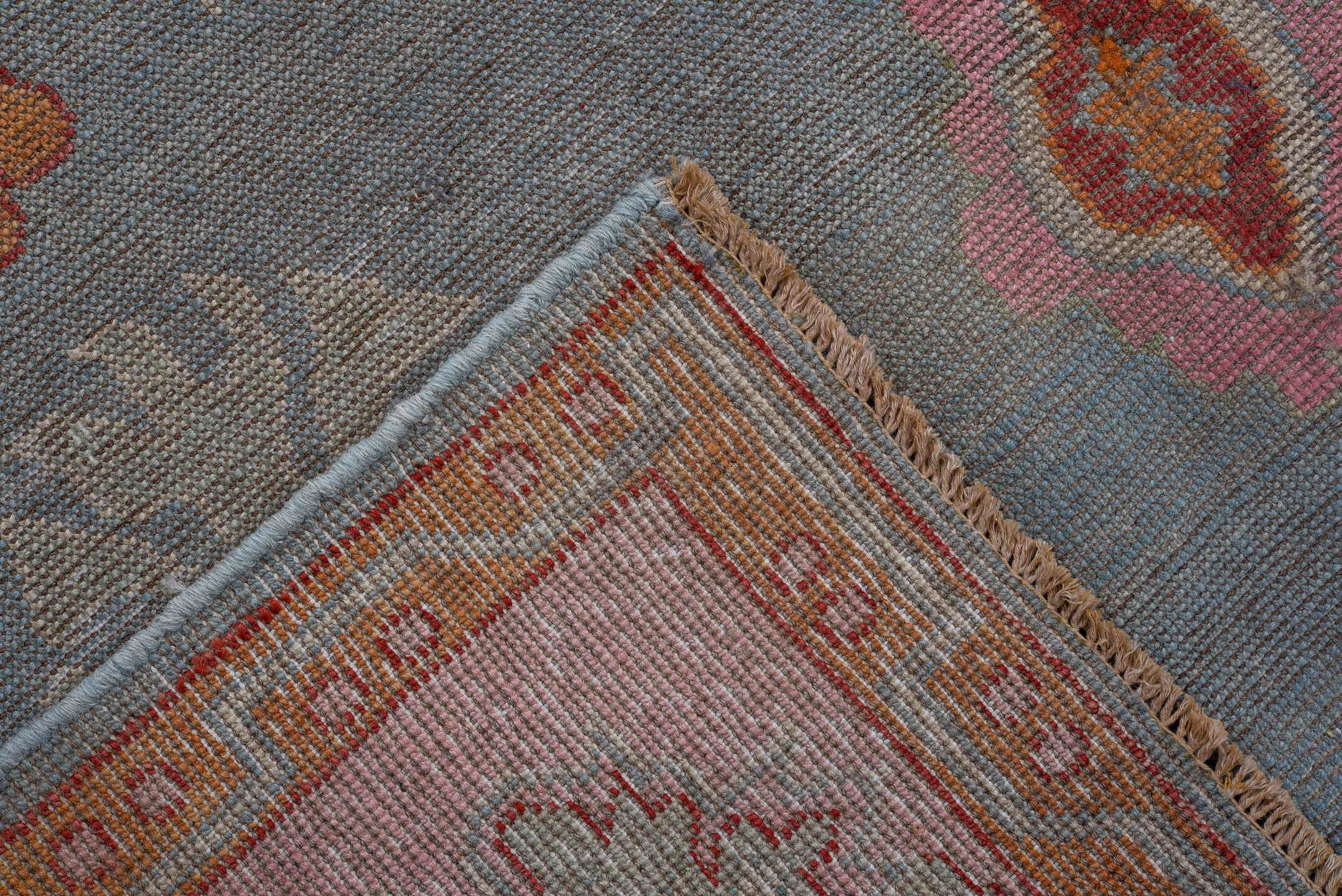 5' x 7' one-of-a-kind handmade vintage Oushak rug. Color palette: pink, pale blue, coral, ivory, slate, saffron, rose, sage