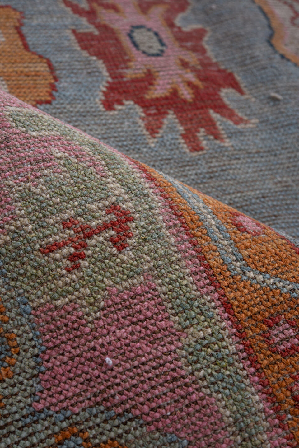 5' x 7' one-of-a-kind handmade vintage Oushak rug. Color palette: pink, pale blue, coral, ivory, slate, saffron, rose, sage