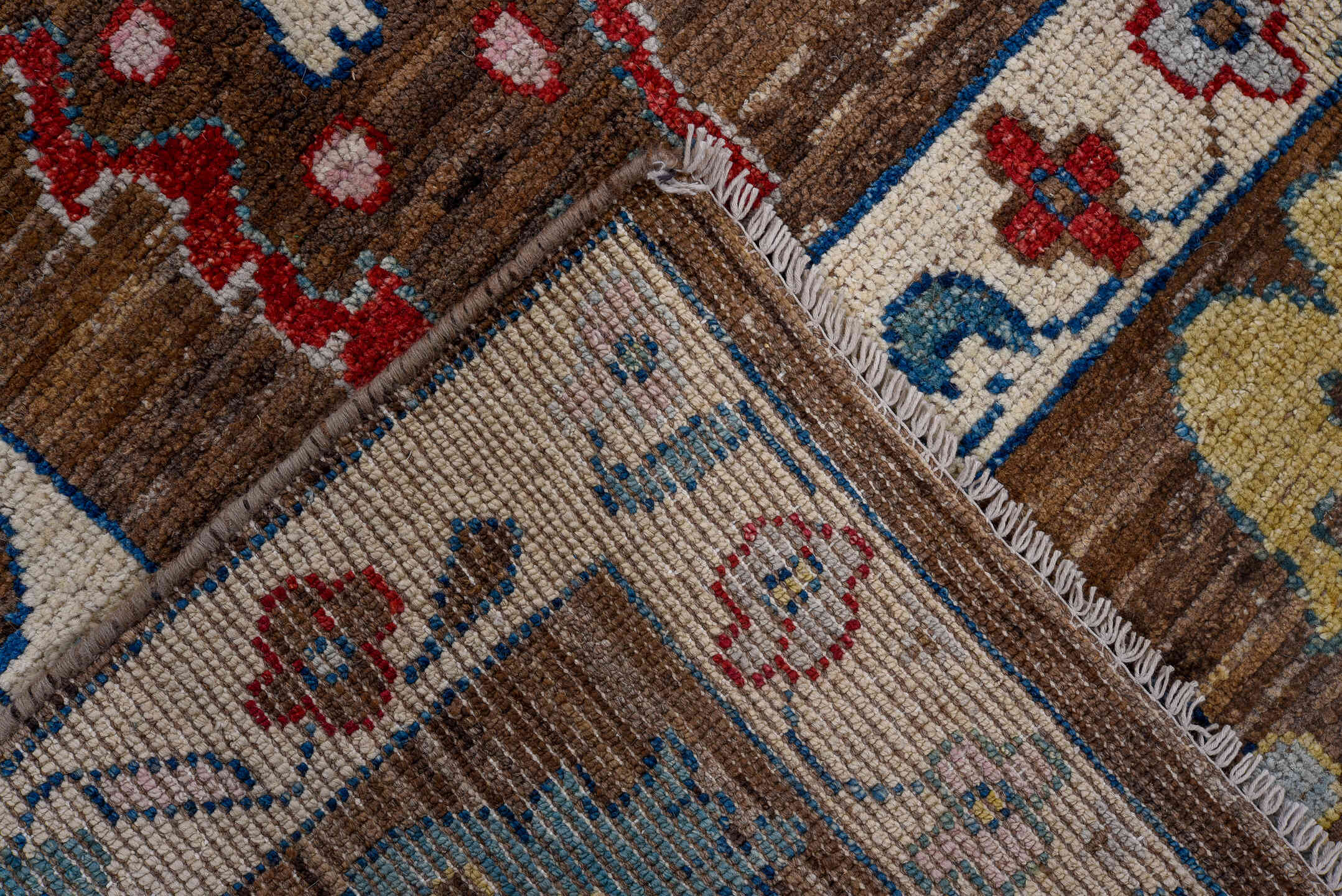 5' x 7' one-of-a-kind handmade vintage Afghan medium size rug. Color palette: brown, ivory, sky blue, crimson, gold, blush