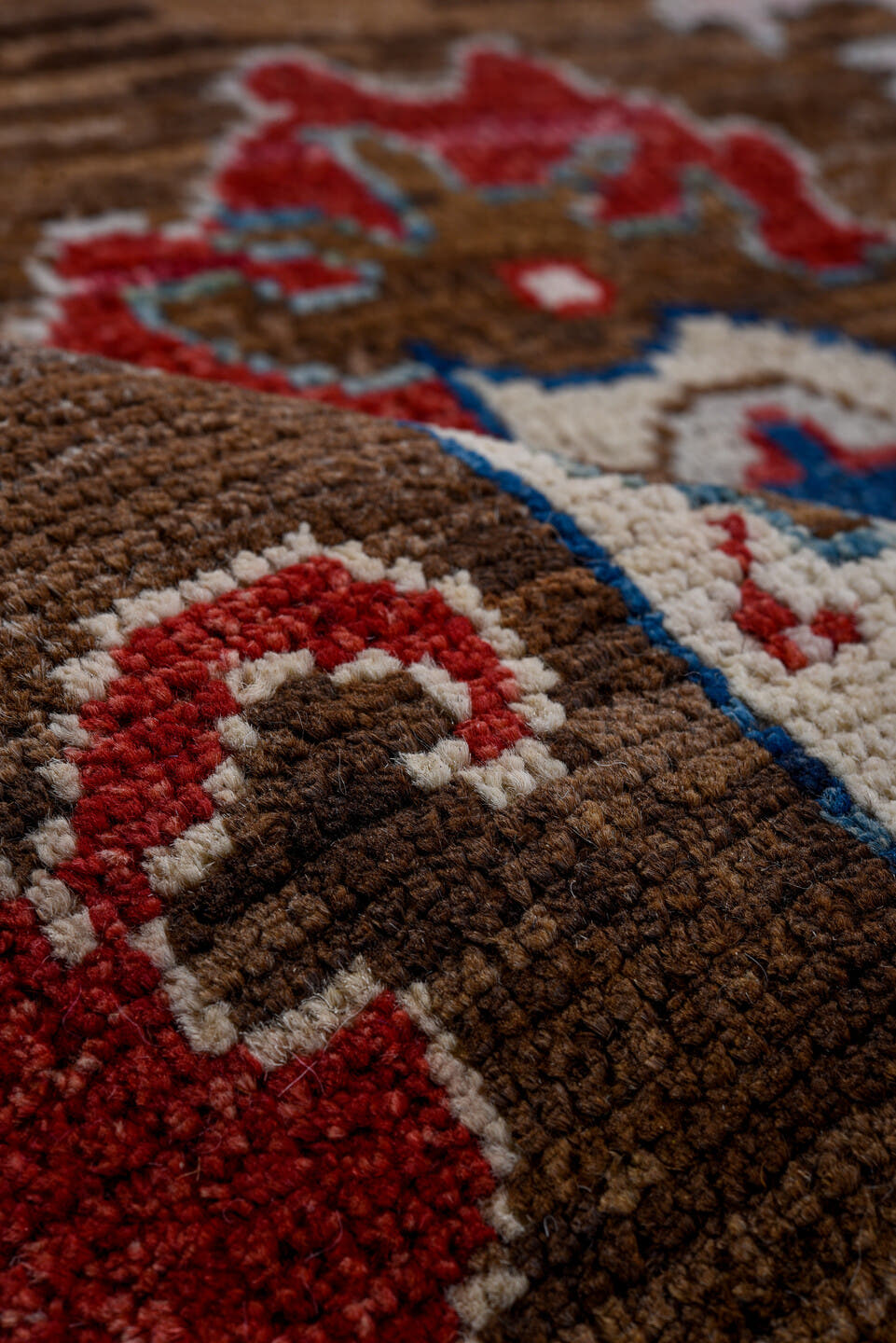 5' x 7' one-of-a-kind handmade vintage Afghan medium size rug. Color palette: brown, ivory, sky blue, crimson, gold, blush