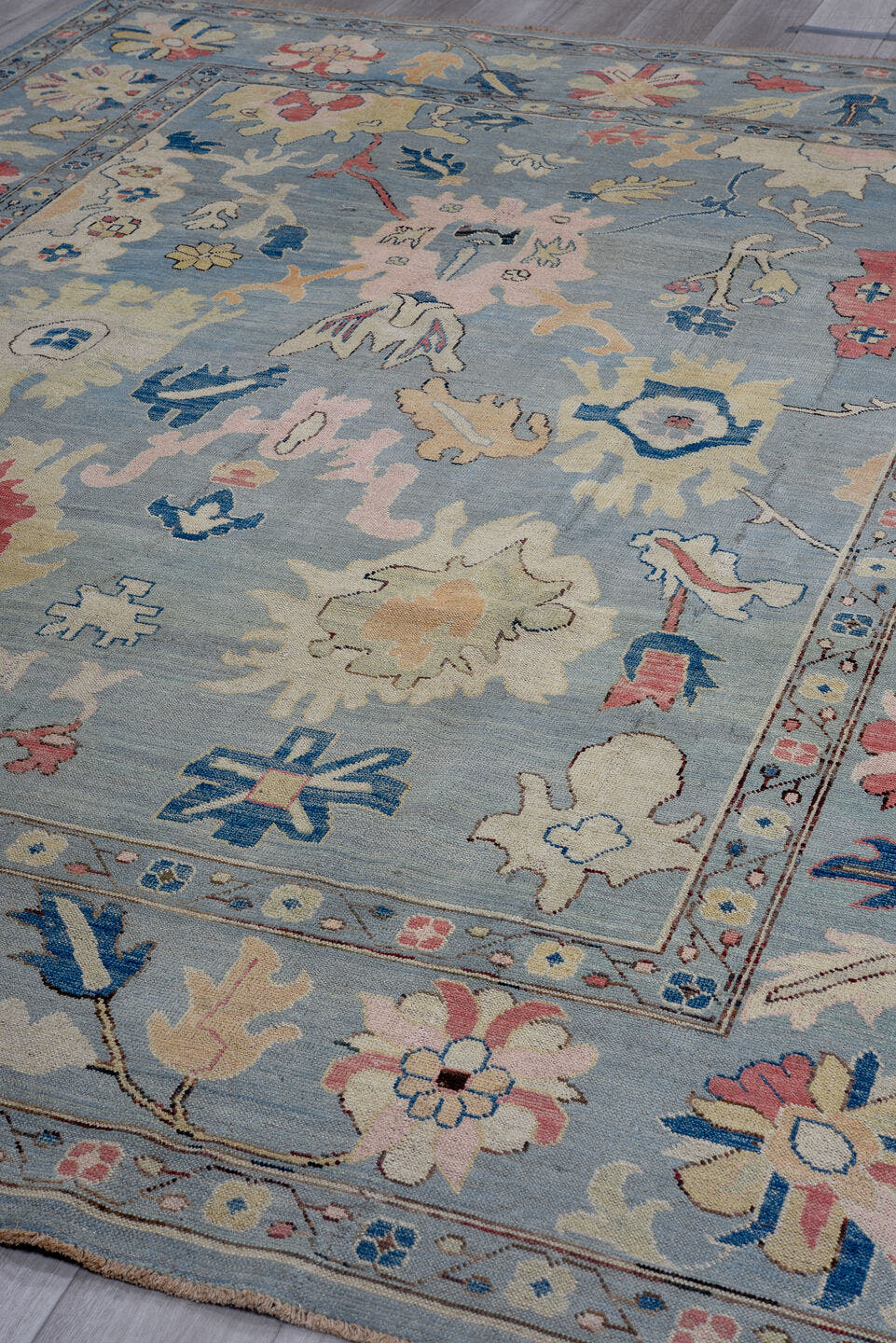 8' x 11' one-of-a-kind handmade vintage Oushak large size rug. Color palette: light blue, ivory, pink, navy, peach, gold