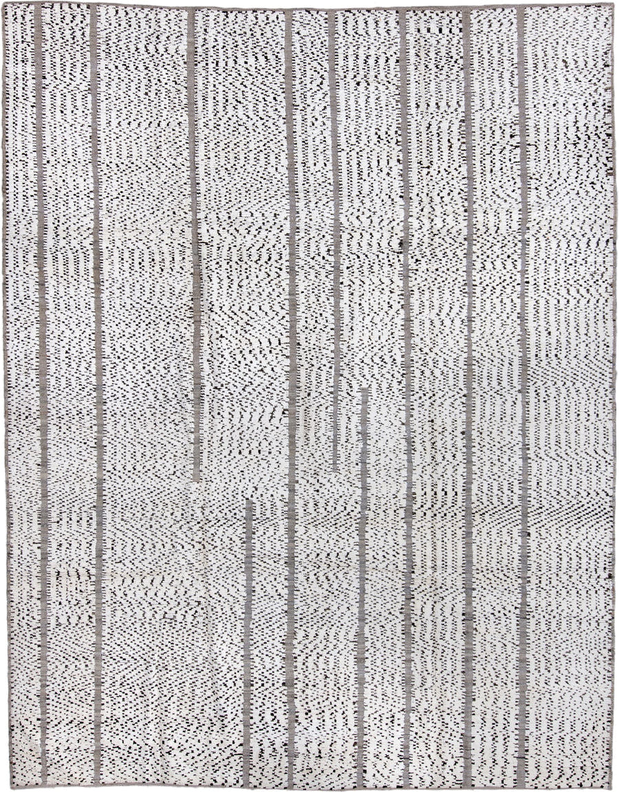 7' x 9' one-of-a-kind handmade vintage Tulu rug. Color palette: ivory, charcoal, taupe, gray, black, beige