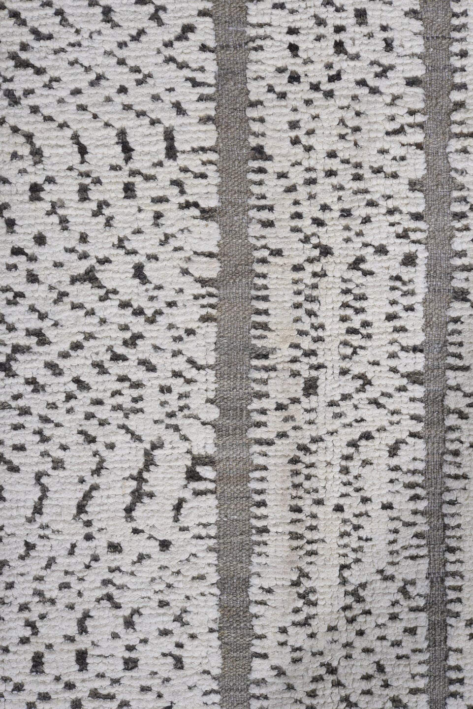 7' x 9' one-of-a-kind handmade vintage Tulu rug. Color palette: ivory, charcoal, taupe, gray, black, beige