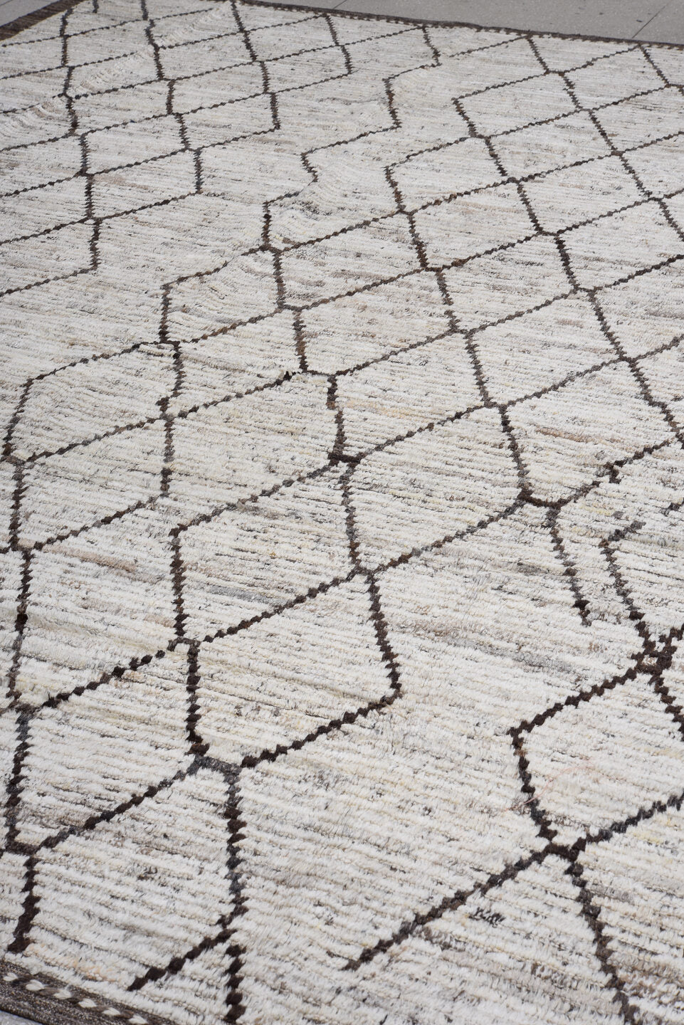 10' x 12' one-of-a-kind handmade vintage Tulu large size rug. Color palette: ivory, brown, taupe, charcoal, beige, gray