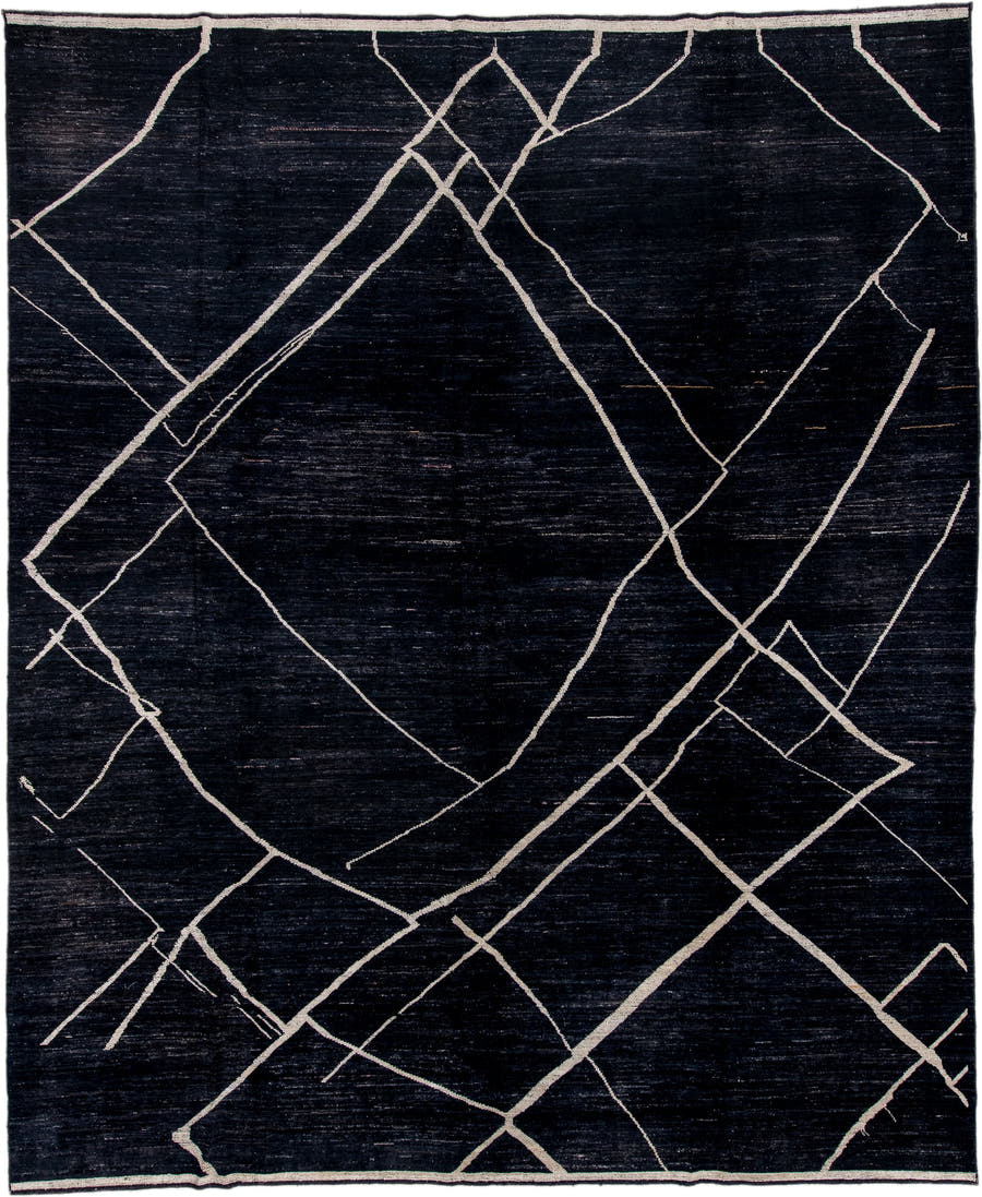 10' x 12' one-of-a-kind handmade vintage Tulu large size rug. Color palette: charcoal, ivory, gray, black