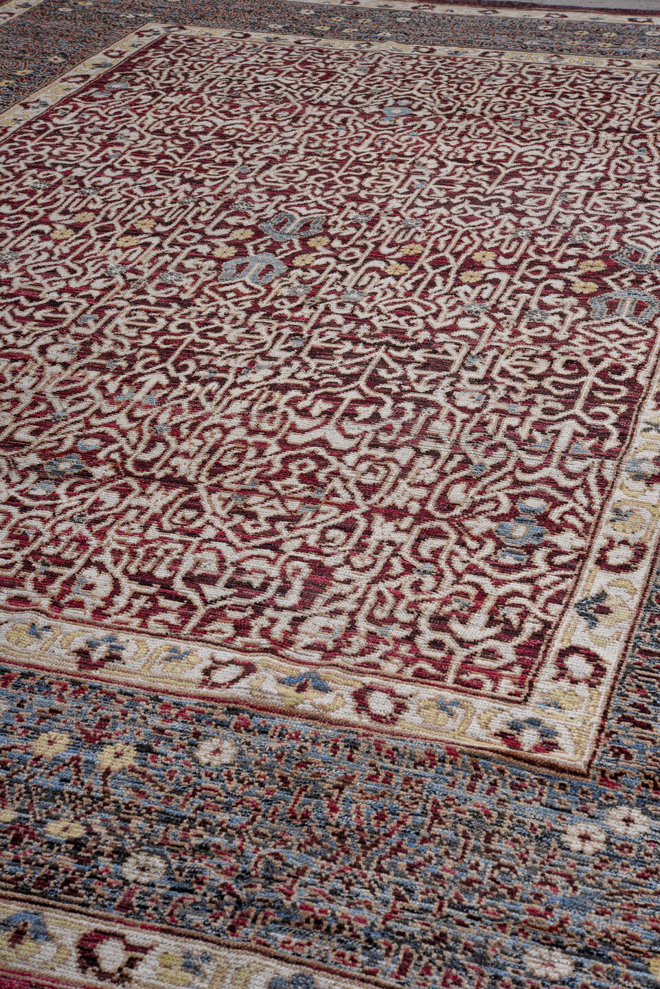 10' x 14' one-of-a-kind handmade vintage Khotan large size rug. Color palette: burgundy, ivory, slate, blue, rose, charcoal