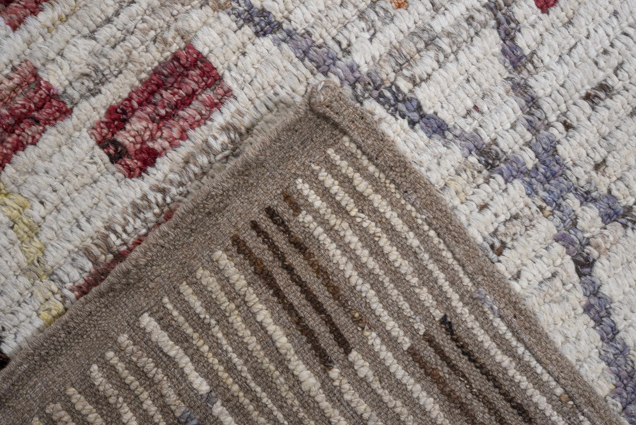 8' x 9' one-of-a-kind handmade vintage Tulu large size rug. Color palette: ivory, brown, rust, rose, lavender, taupe, gold