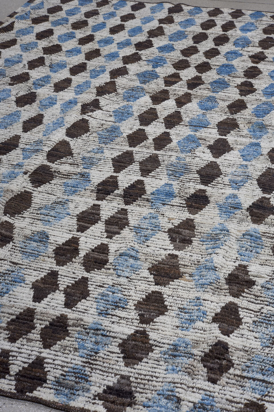 8' x 10' one-of-a-kind handmade vintage Tulu large size rug. Color palette: ivory, charcoal, sky blue, slate, gray, black