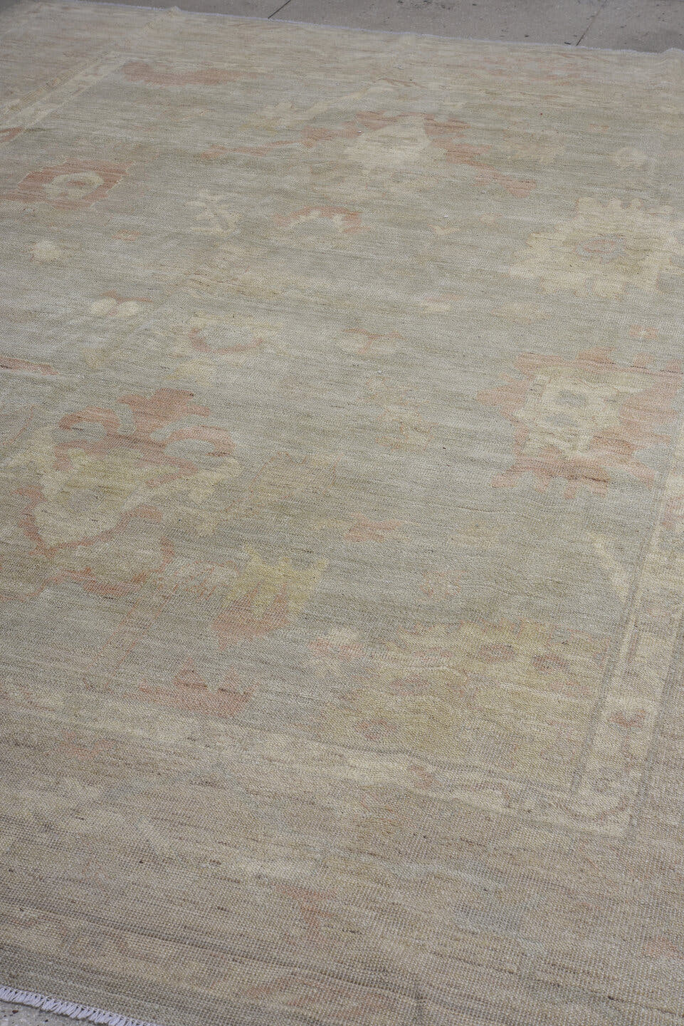 9' x 12' one-of-a-kind handmade vintage Oushak large size rug. Color palette: taupe, ivory, peach, beige, sage, camel, gray