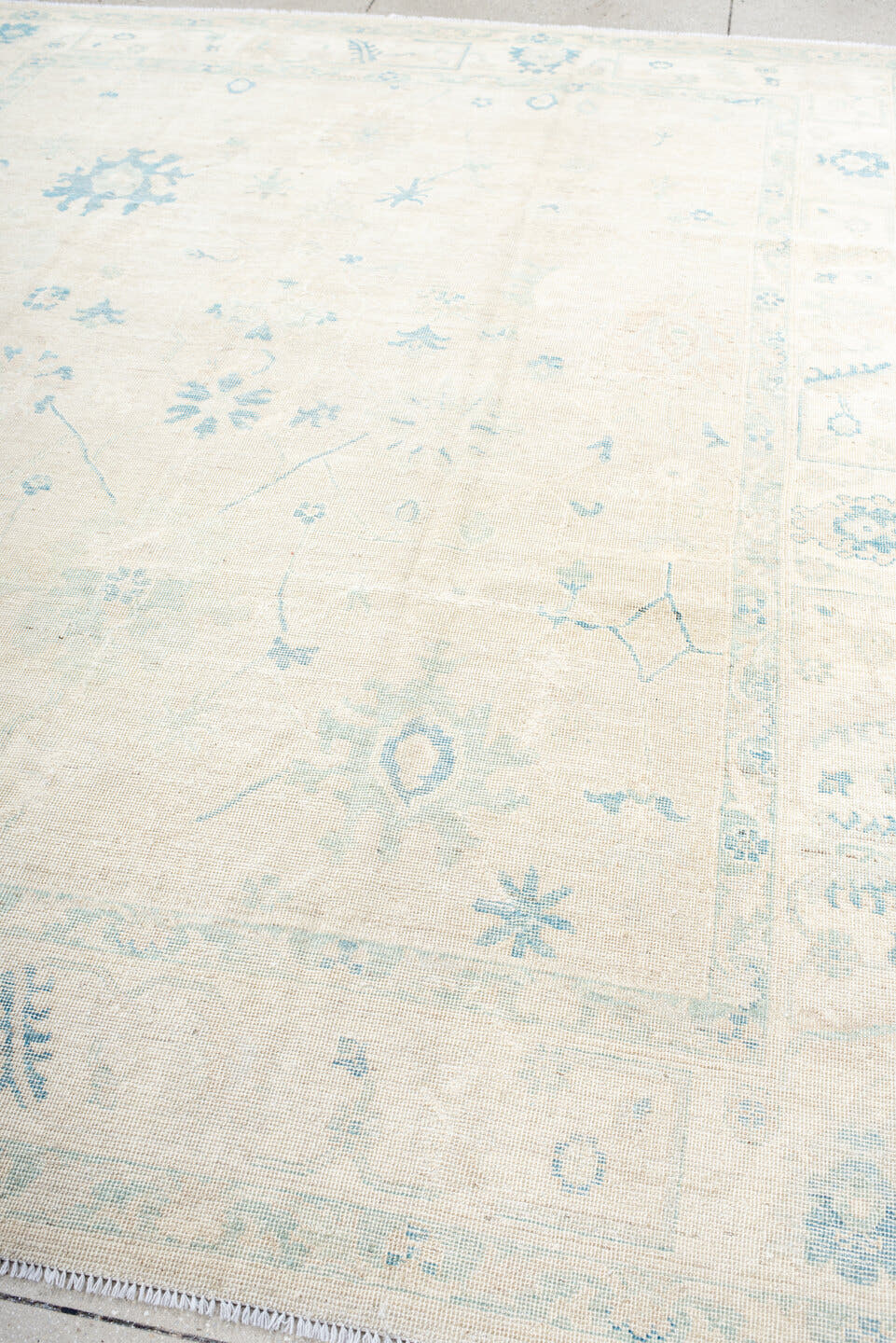 8' x 10' one-of-a-kind handmade vintage Oushak large size rug. Color palette: ivory, pale blue, cream, beige, light blue