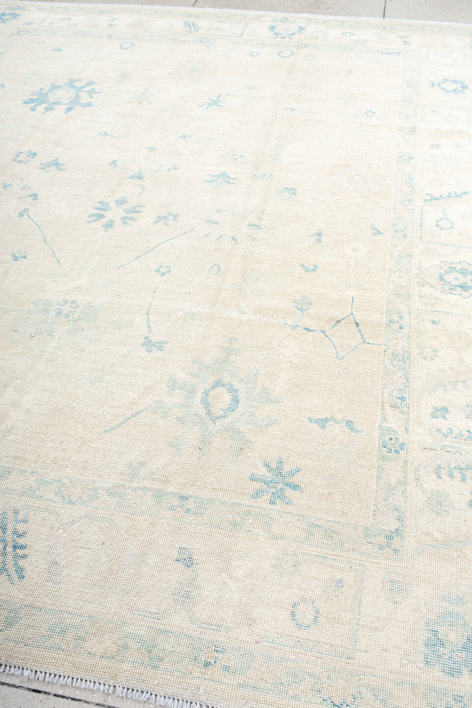 8' x 10' one-of-a-kind handmade vintage Oushak large size rug. Color palette: ivory, pale blue, cream, beige, light blue
