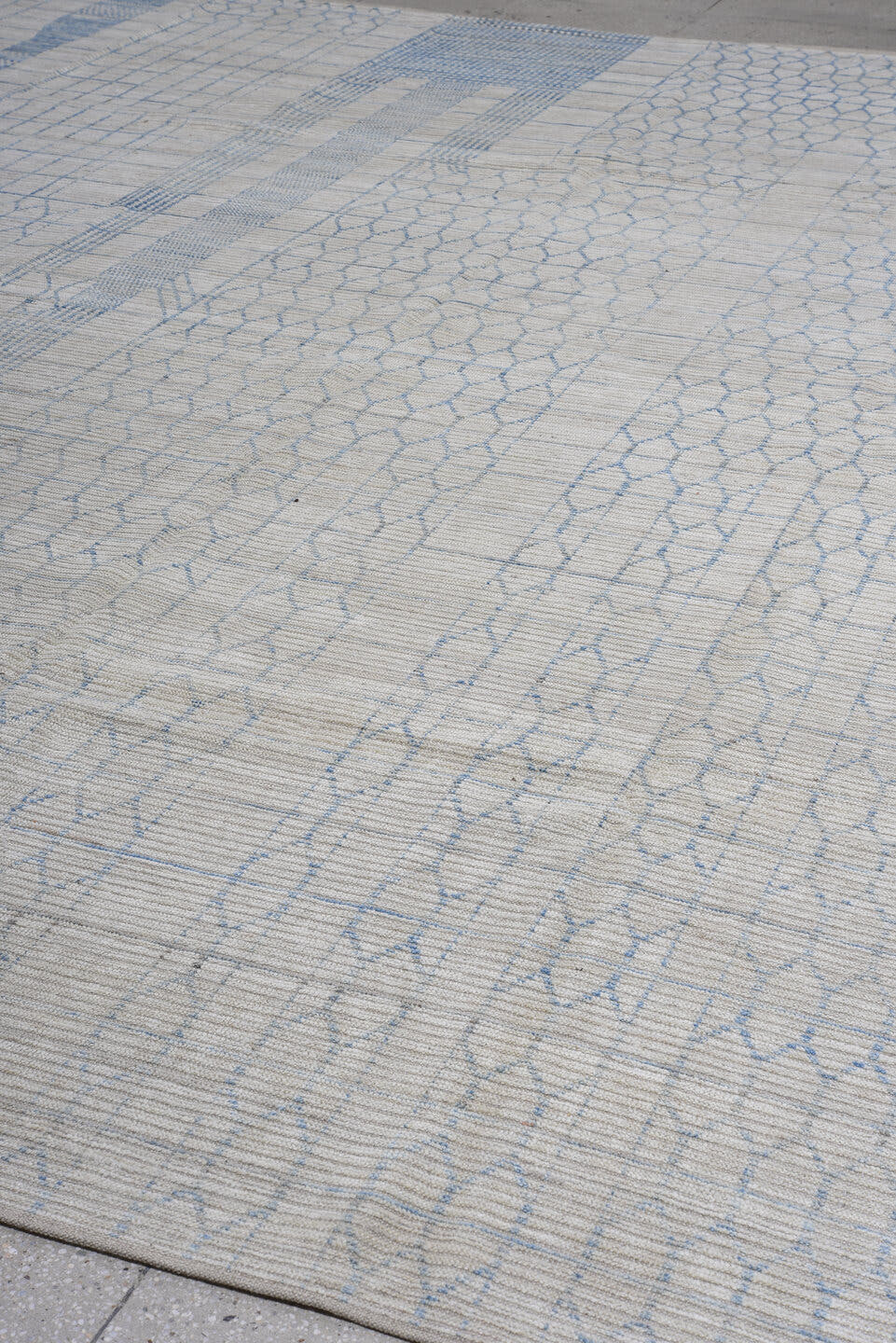 12' x 15' one-of-a-kind handmade vintage Tulu oversize rug. Color palette: ivory, sky_blue, light_gray, light blue