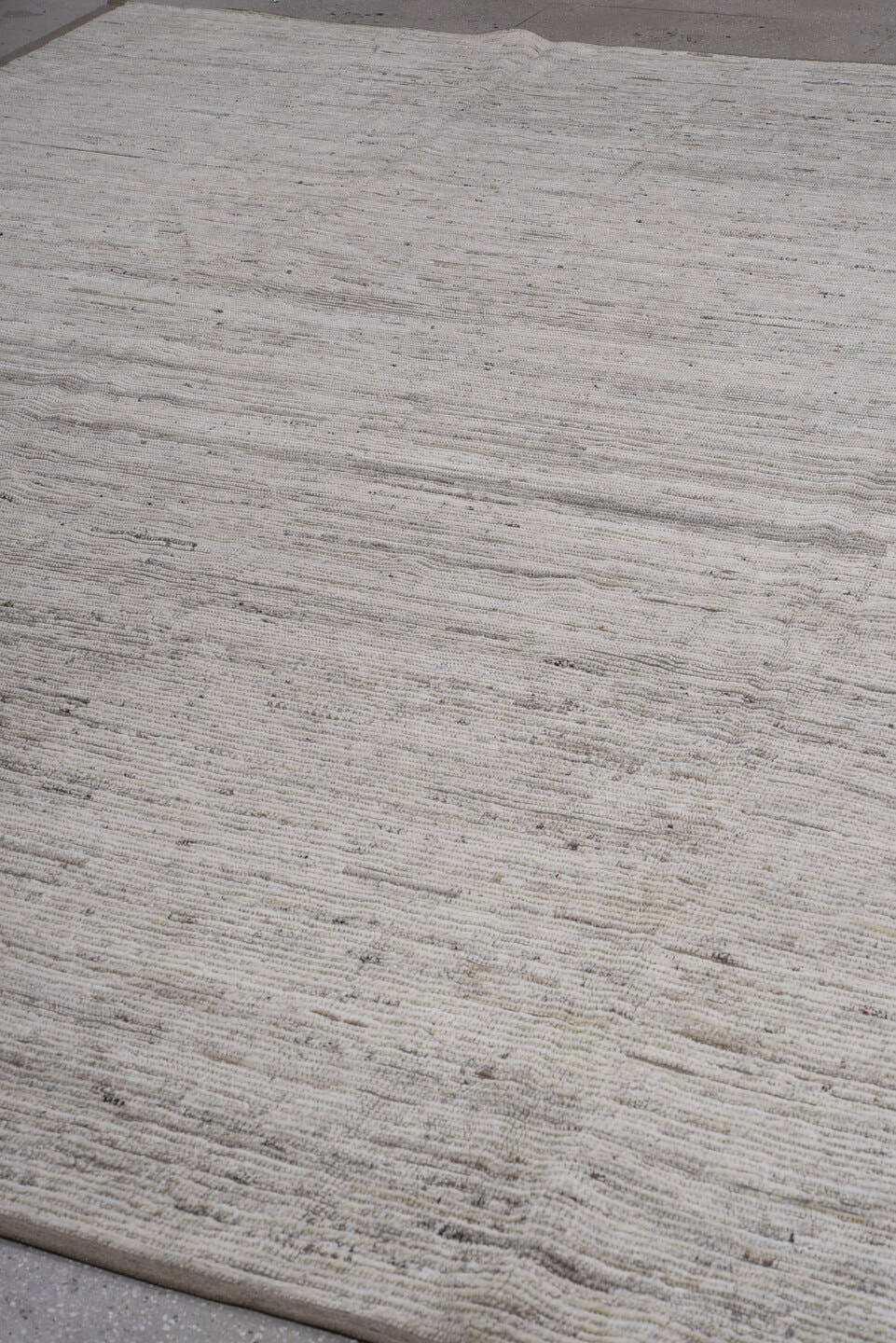 11' x 13' one-of-a-kind handmade vintage Tulu oversize rug. Color palette: ivory, taupe, cream, beige, gray