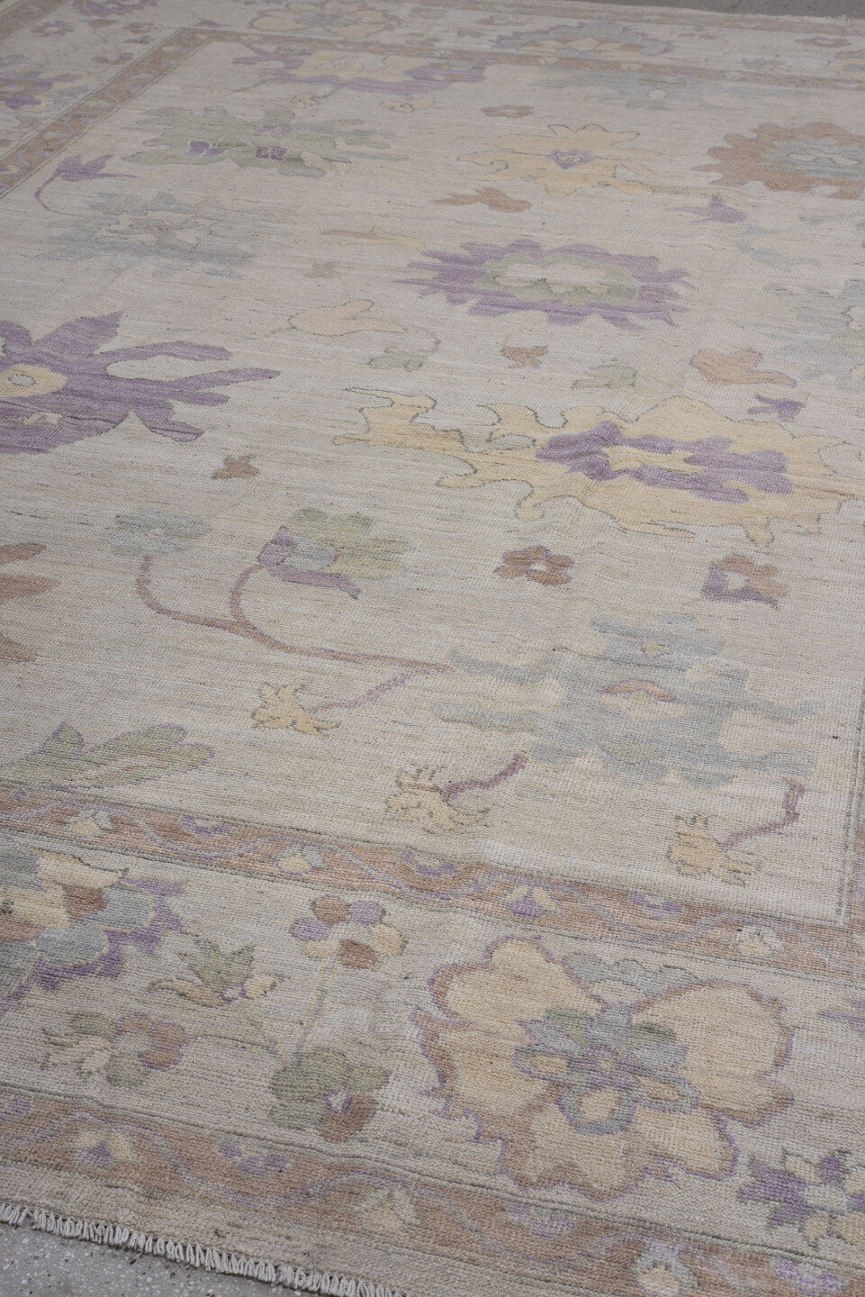 10' x 14' one-of-a-kind handmade vintage Oushak large size rug. Color palette: ivory, lavender, taupe, sage, pale blue